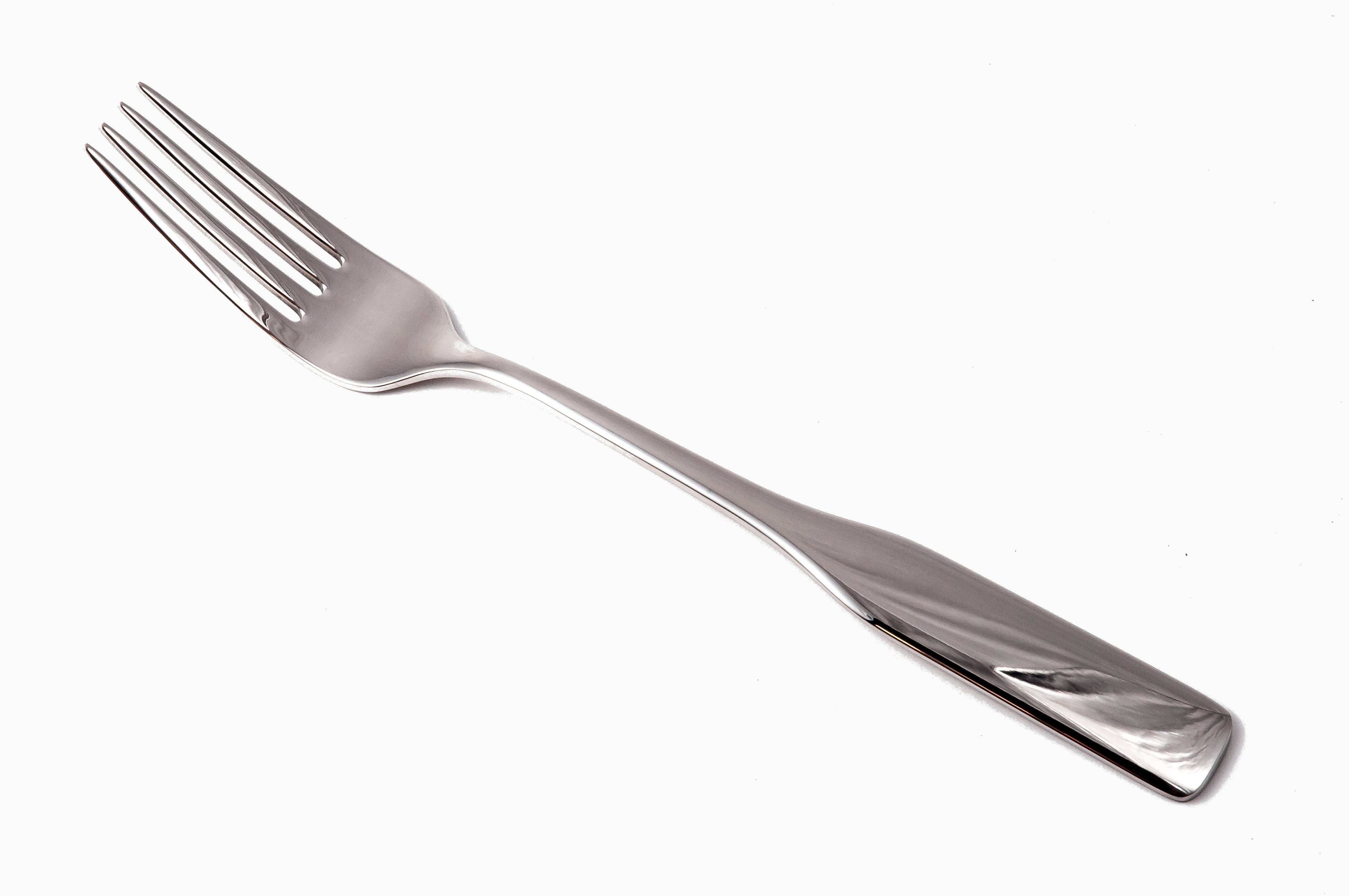 Stainless Steel Fork on White Background · Free Stock Photo