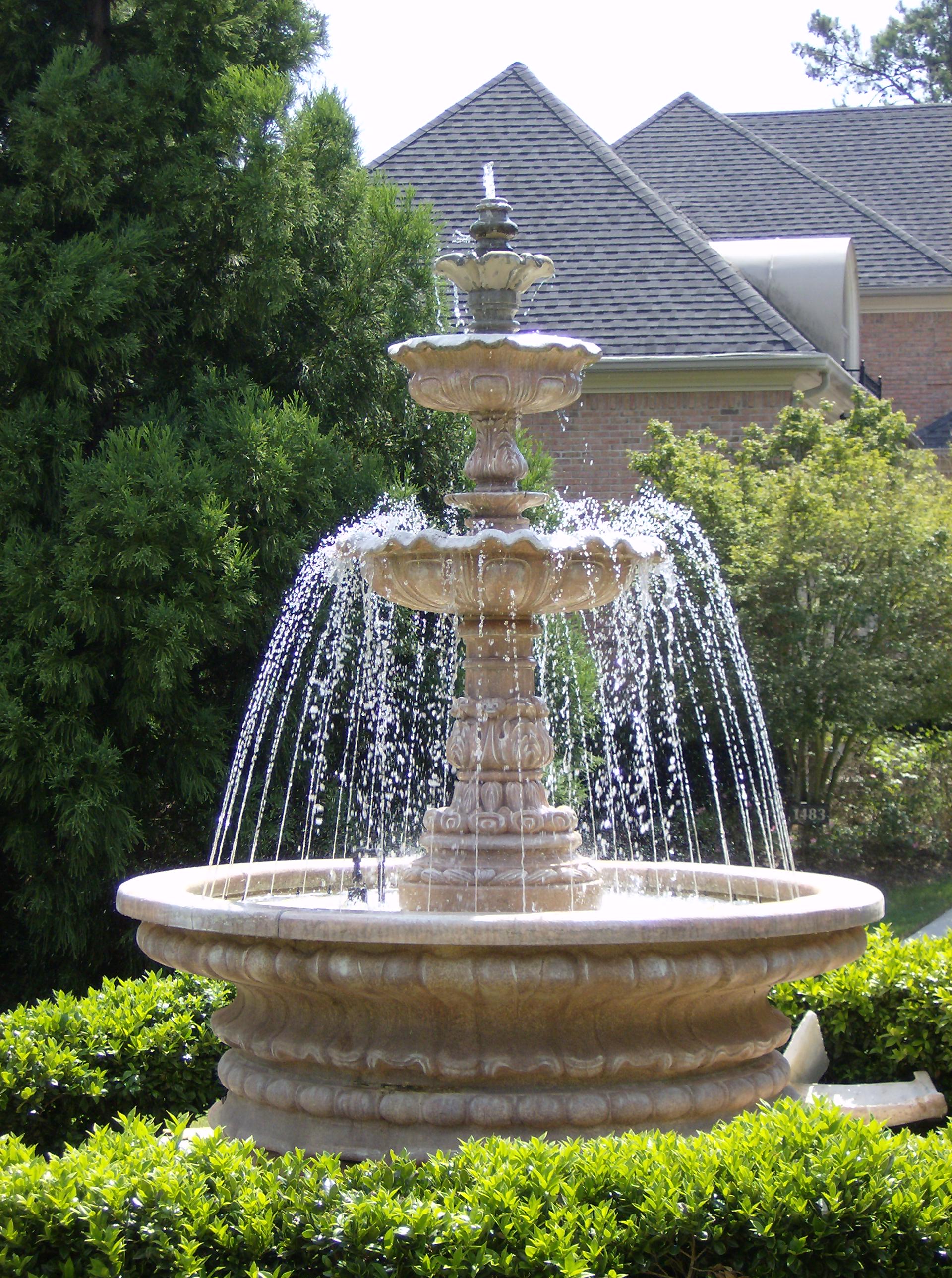 Fountain in garden photo