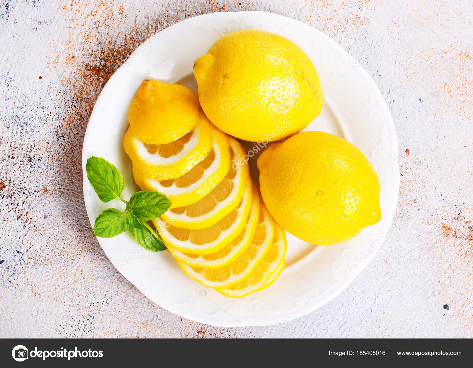 Fresh Lemons Lemon Slices Plate — Stock Photo © tycoon #185408016