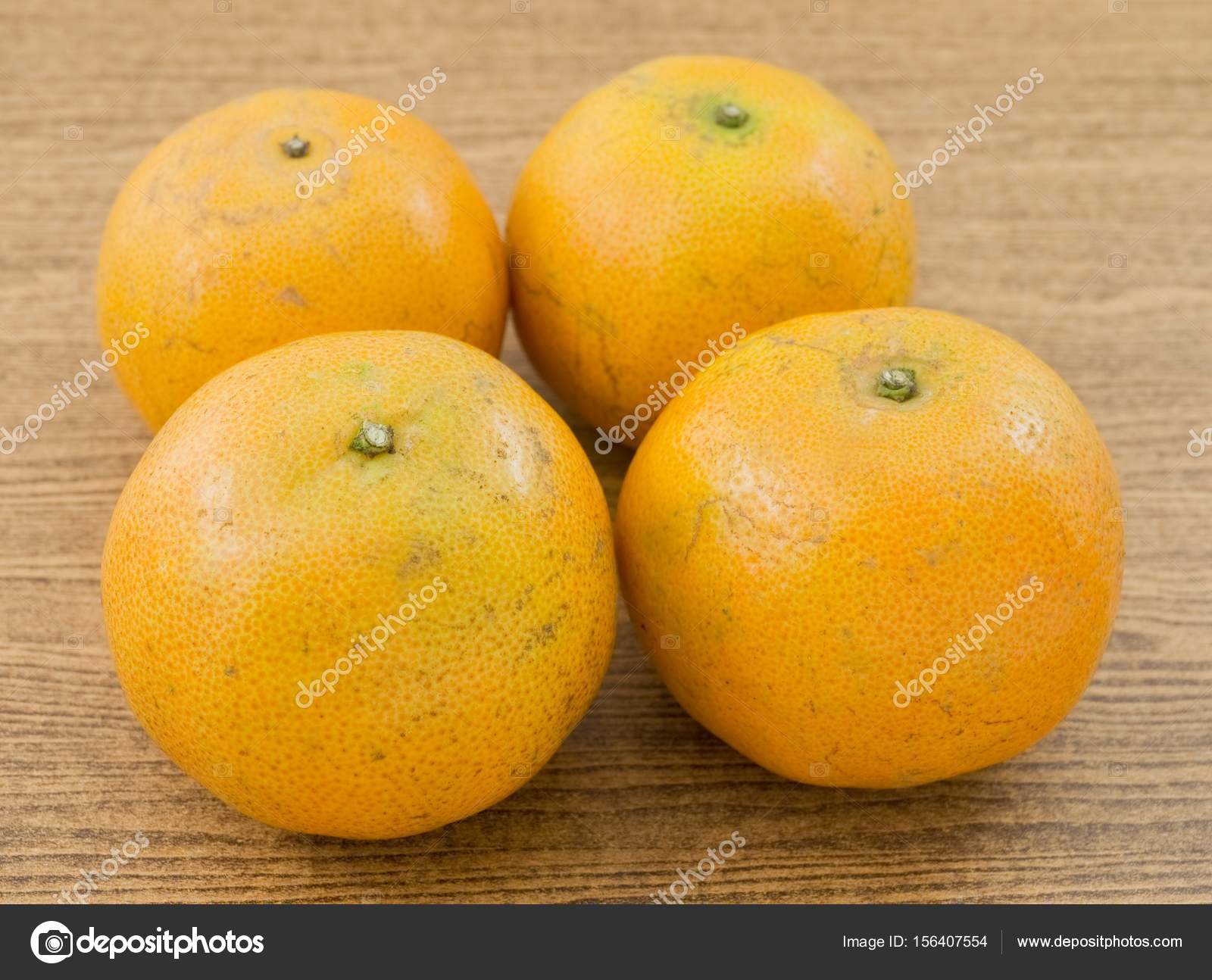 Four Fresh Oranges on A Wooden Board — Stock Photo © Arayabandit ...