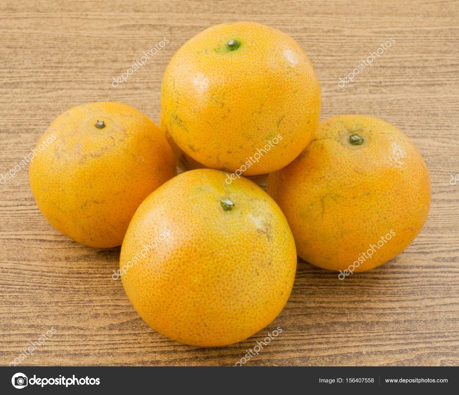 Five Fresh Oranges on A Wooden Table — Stock Photo © Arayabandit ...