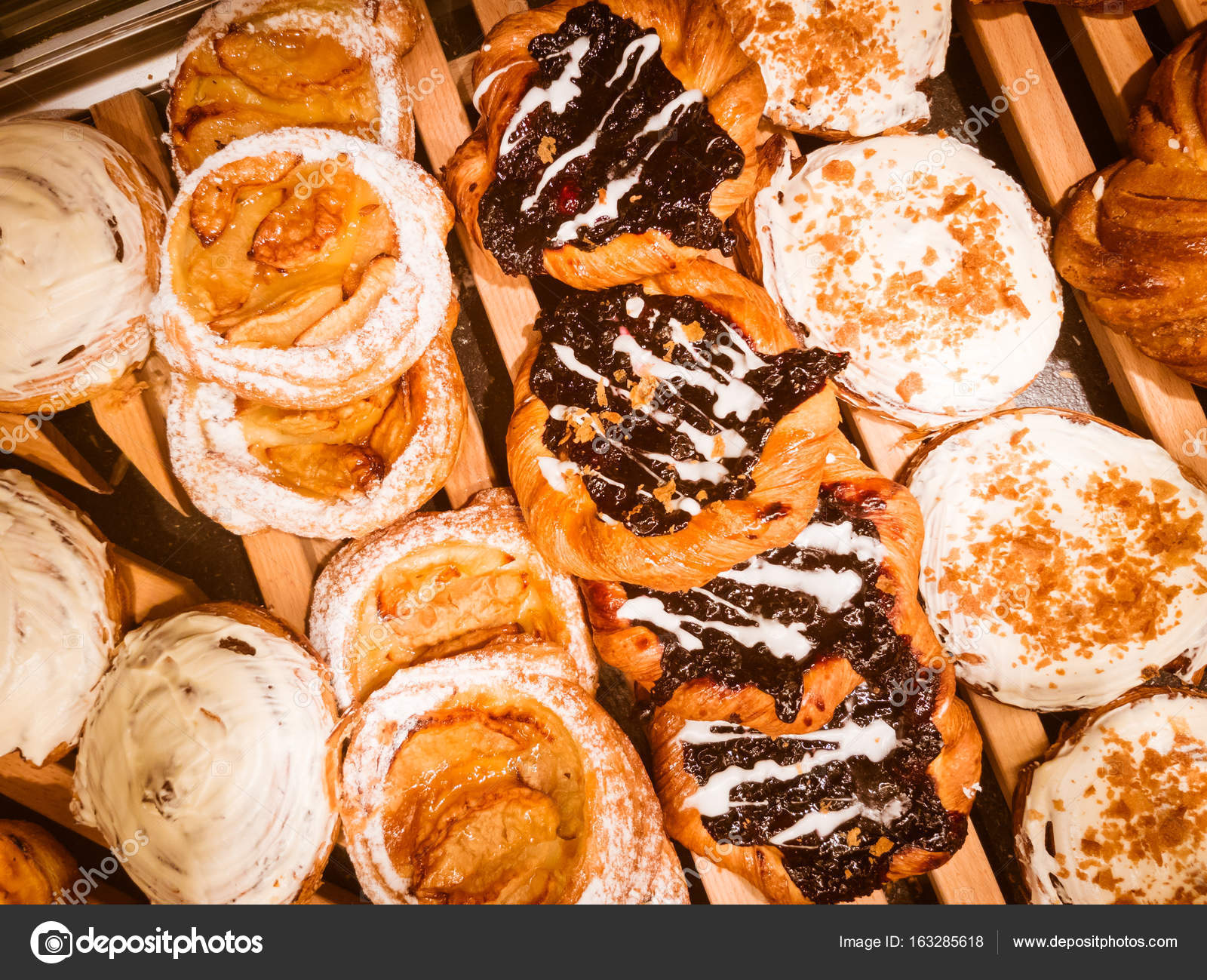 Fresh pastries for sale in the bakery — Stock Photo © toxawww #163285618