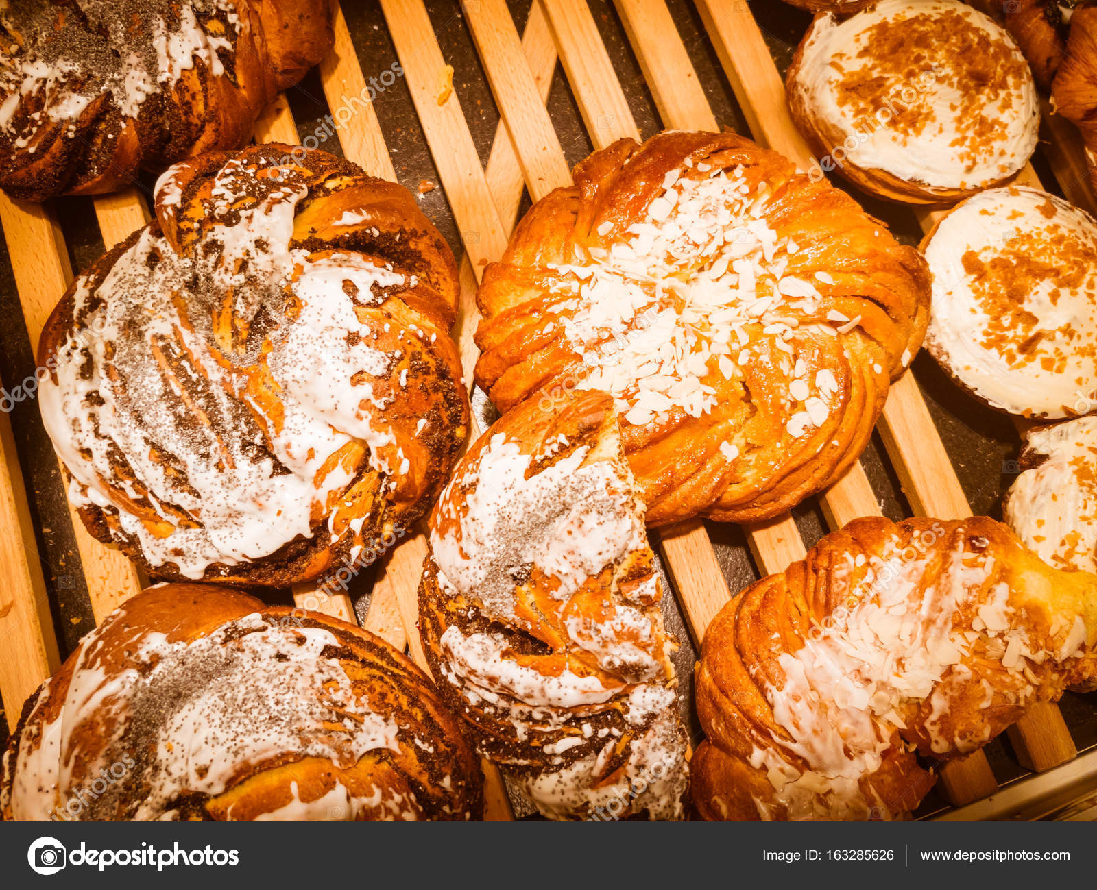 Fresh pastries for sale in the bakery — Stock Photo © toxawww #163285626
