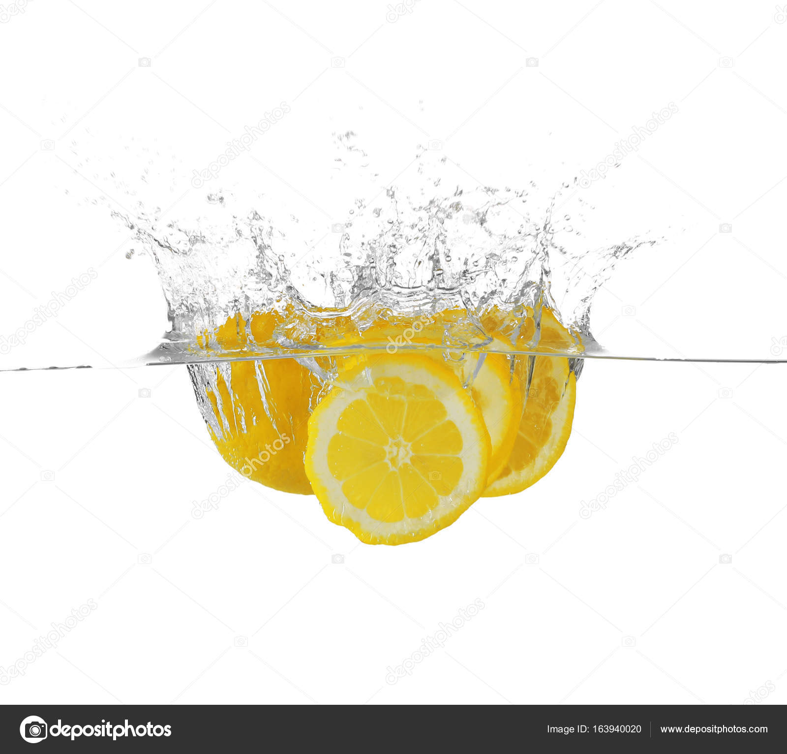 Fresh sliced lemon in water — Stock Photo © belchonock #163940020