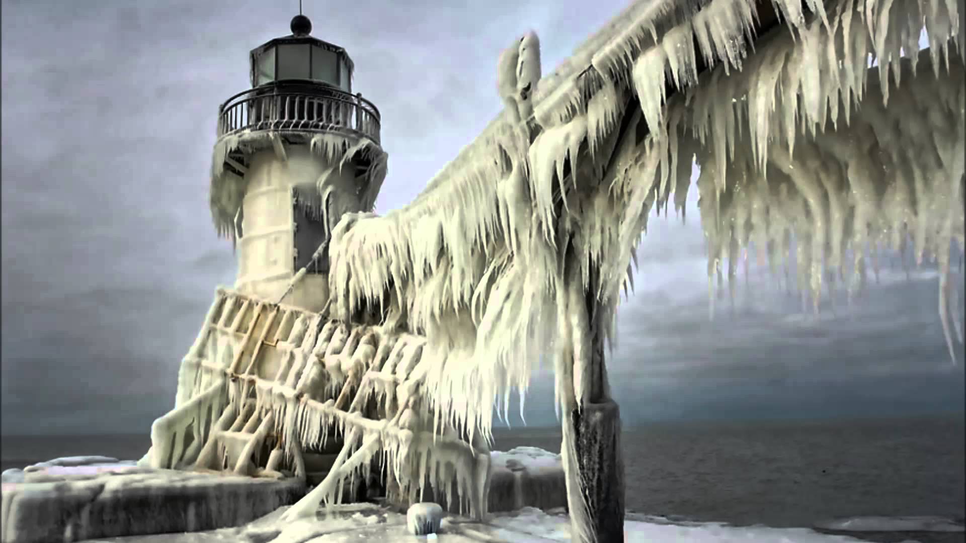 Frozen Lighthouses On Lake Michigan Shore - YouTube
