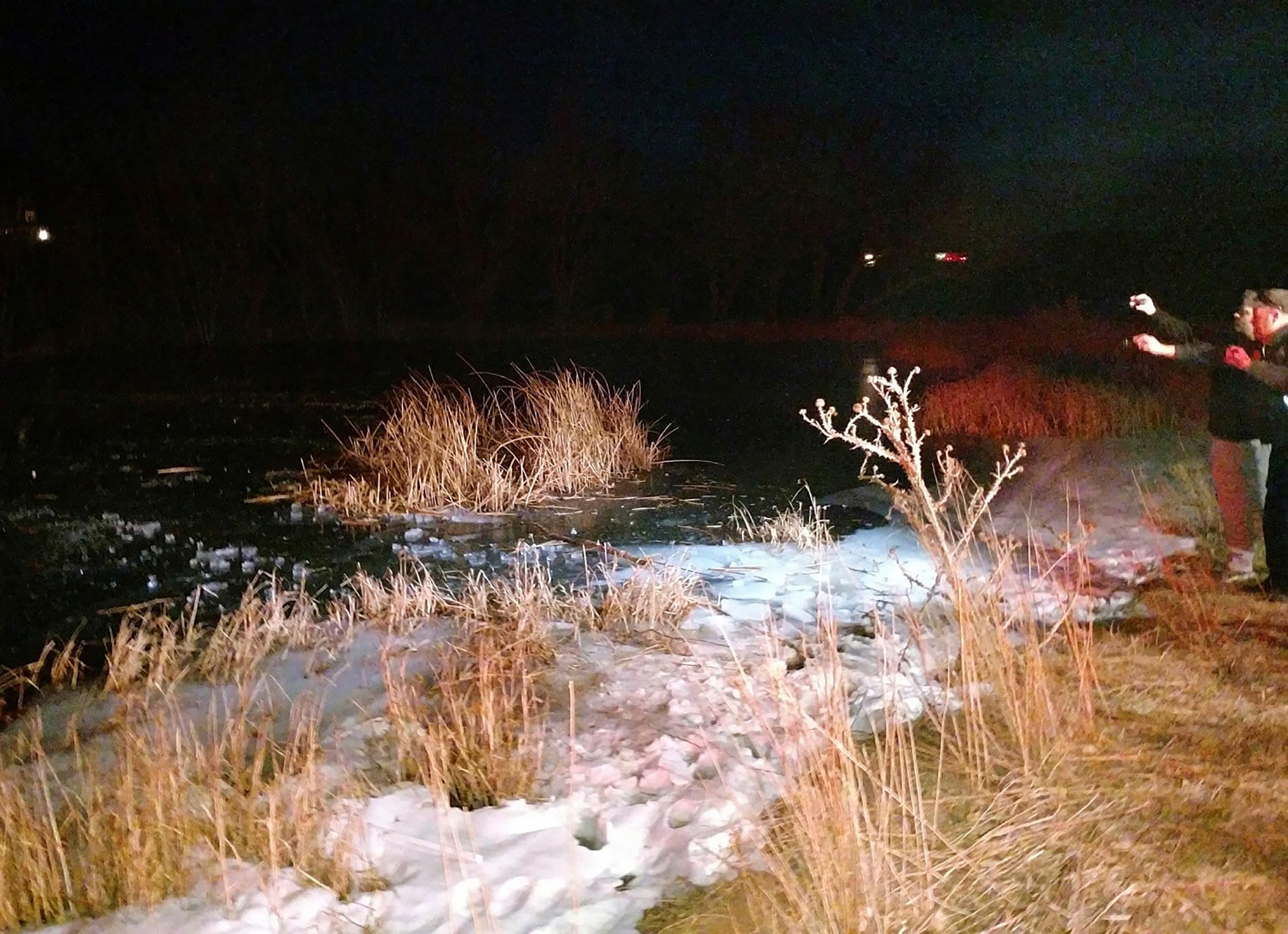 Utah officer punches through frozen pond, dives in to rescue 8-year ...