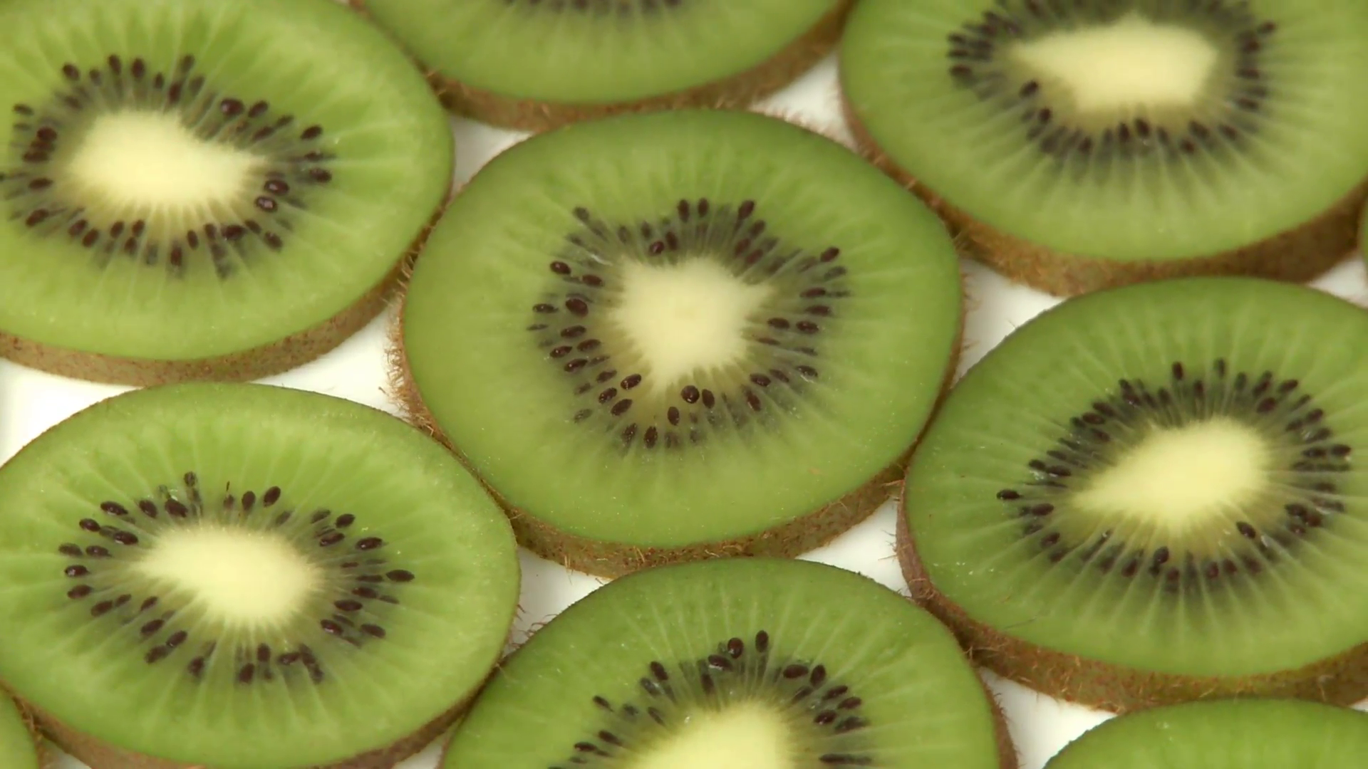 Slices of kiwi fruit closeup Stock Video Footage - Videoblocks