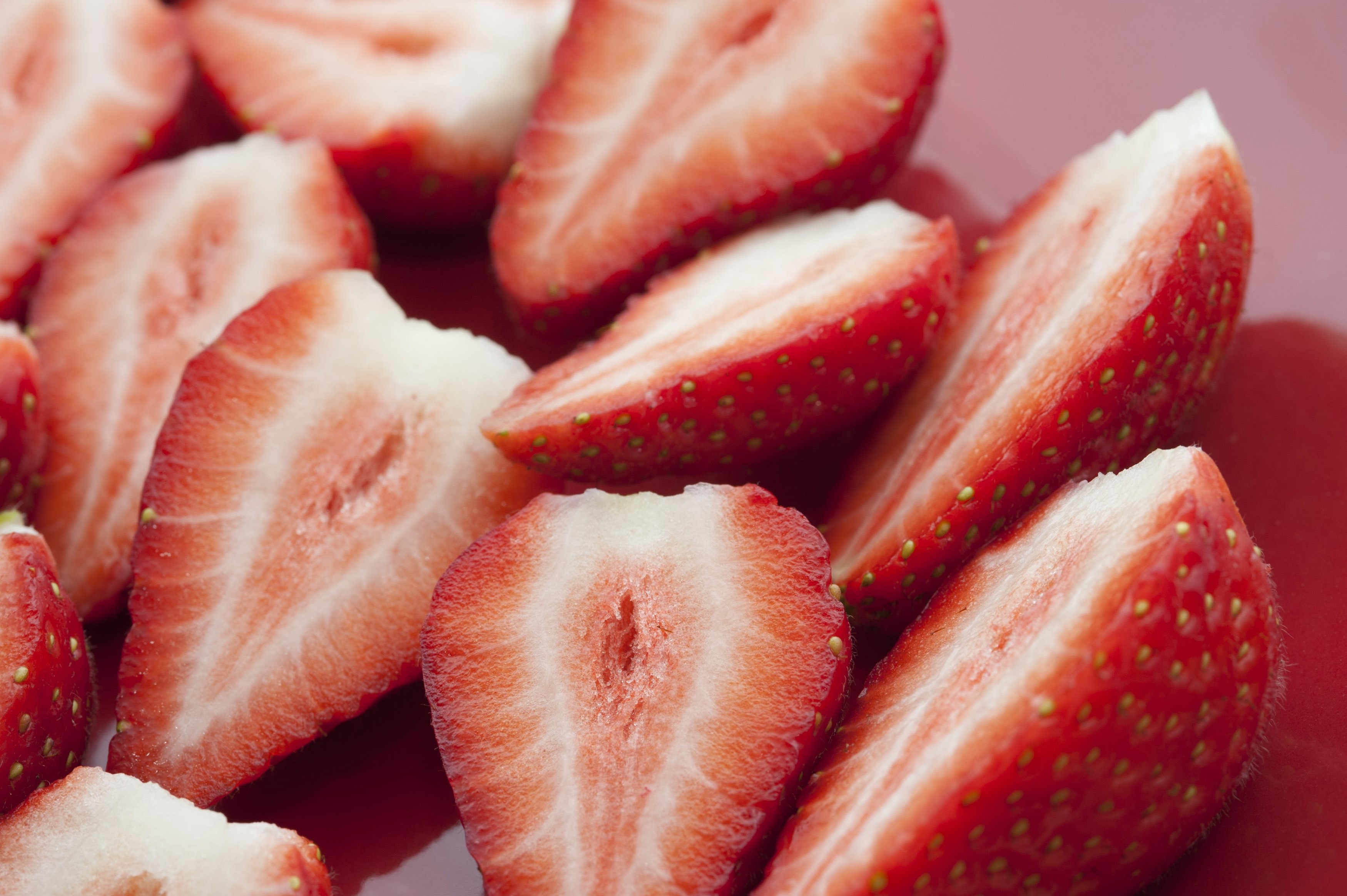 Close up view of halved strawberries - Free Stock Image