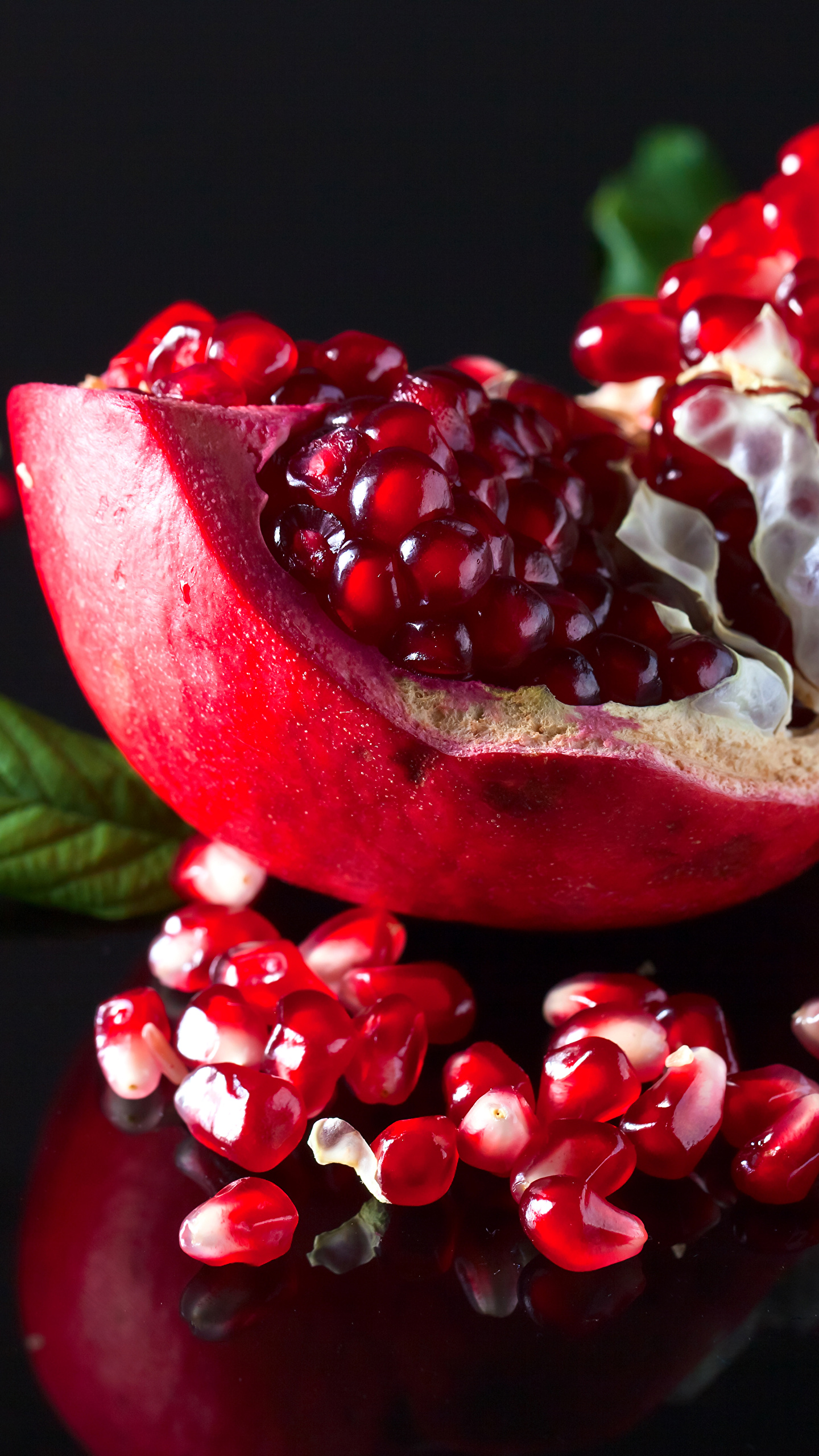 Pictures Grain Pomegranate Food Fruit Closeup Black 1440x2560