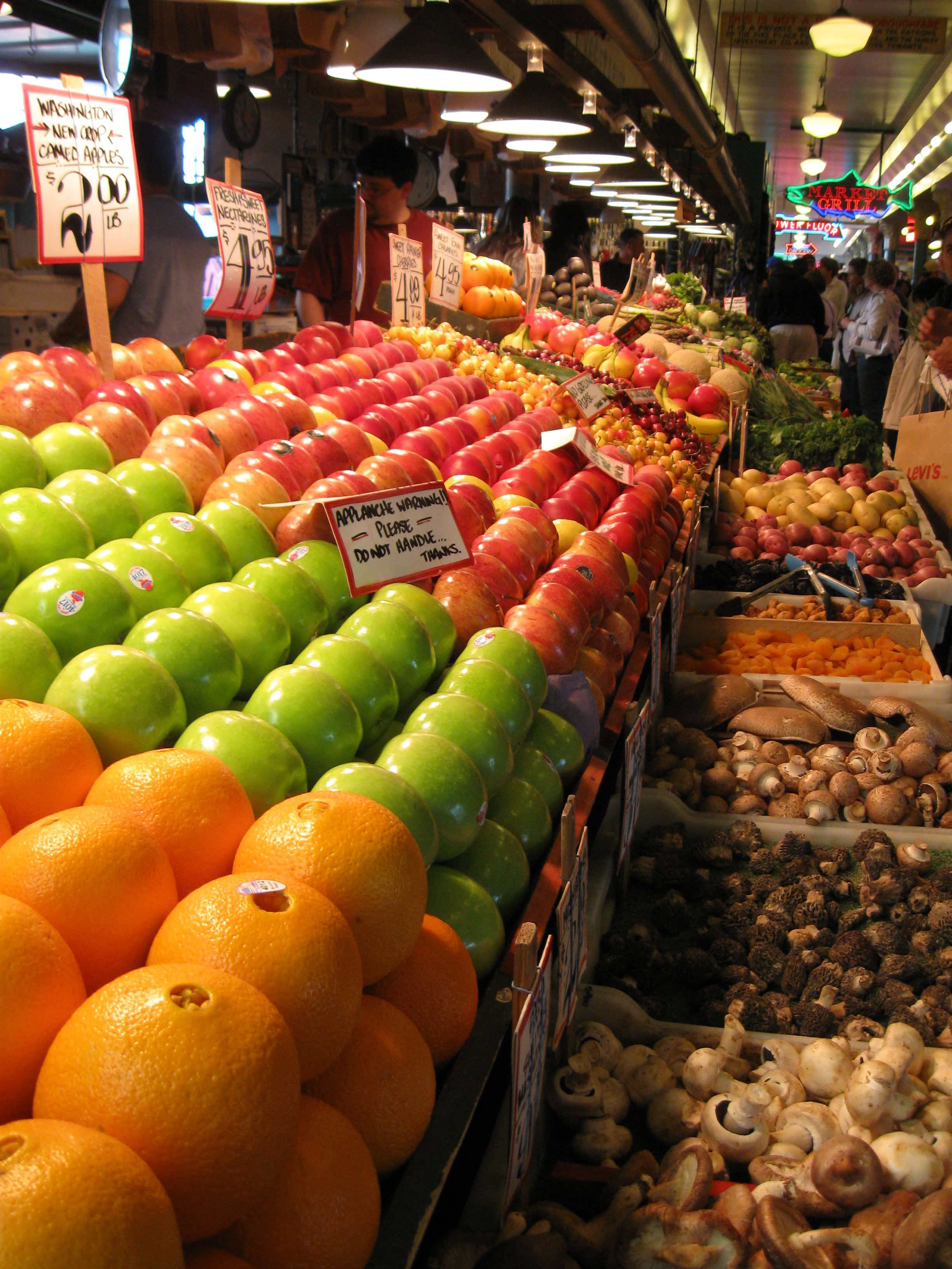 File:36 Pike Place Market very long display of fruits and vegetables ...