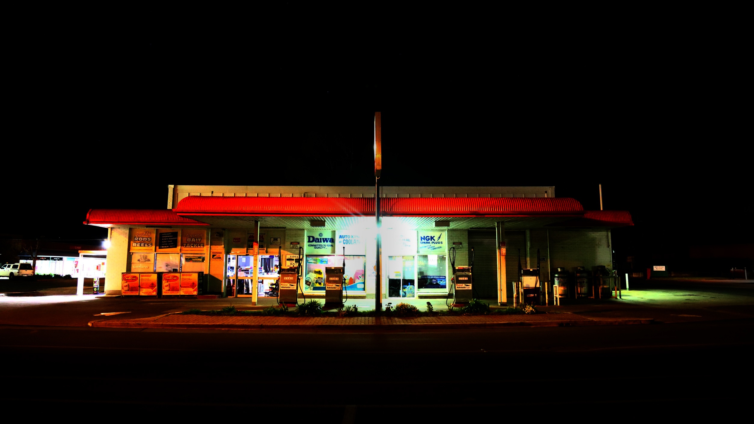 Gas station at night photo