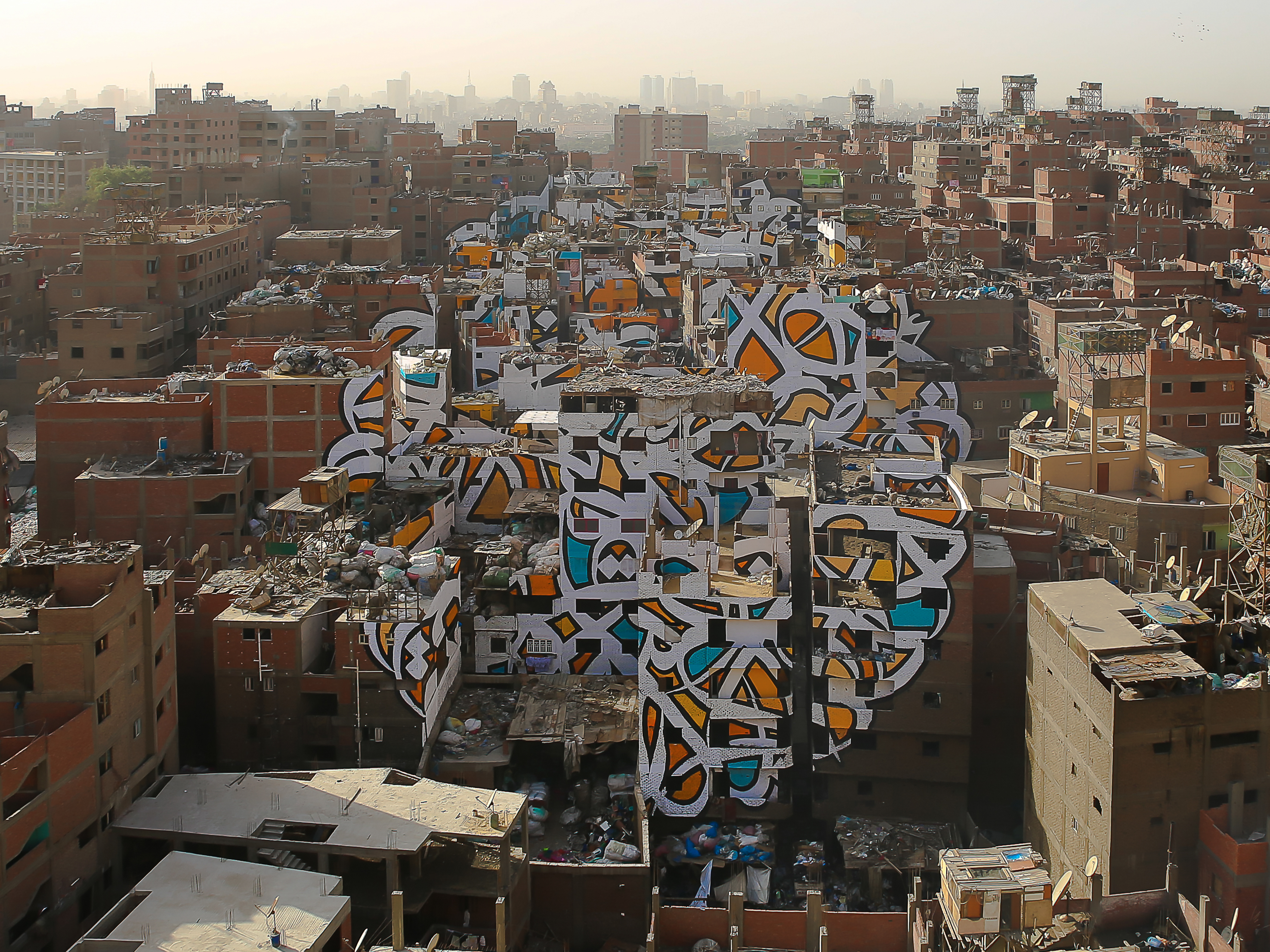 An artist turned 50 buildings in Cairo into a giant mural - Business ...