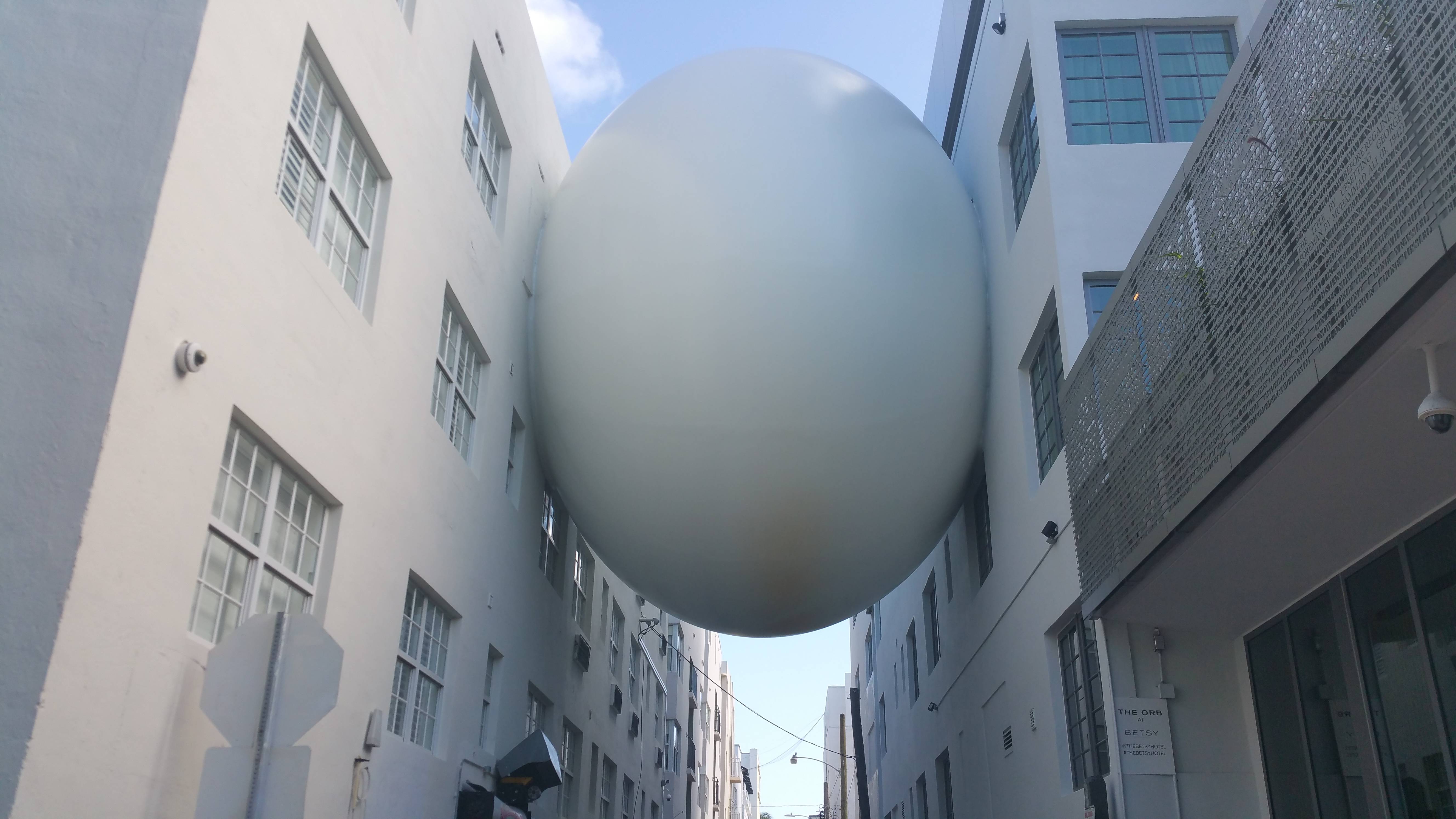 Giant Swiss ball between two buildings in Miami. : whatisthisthing