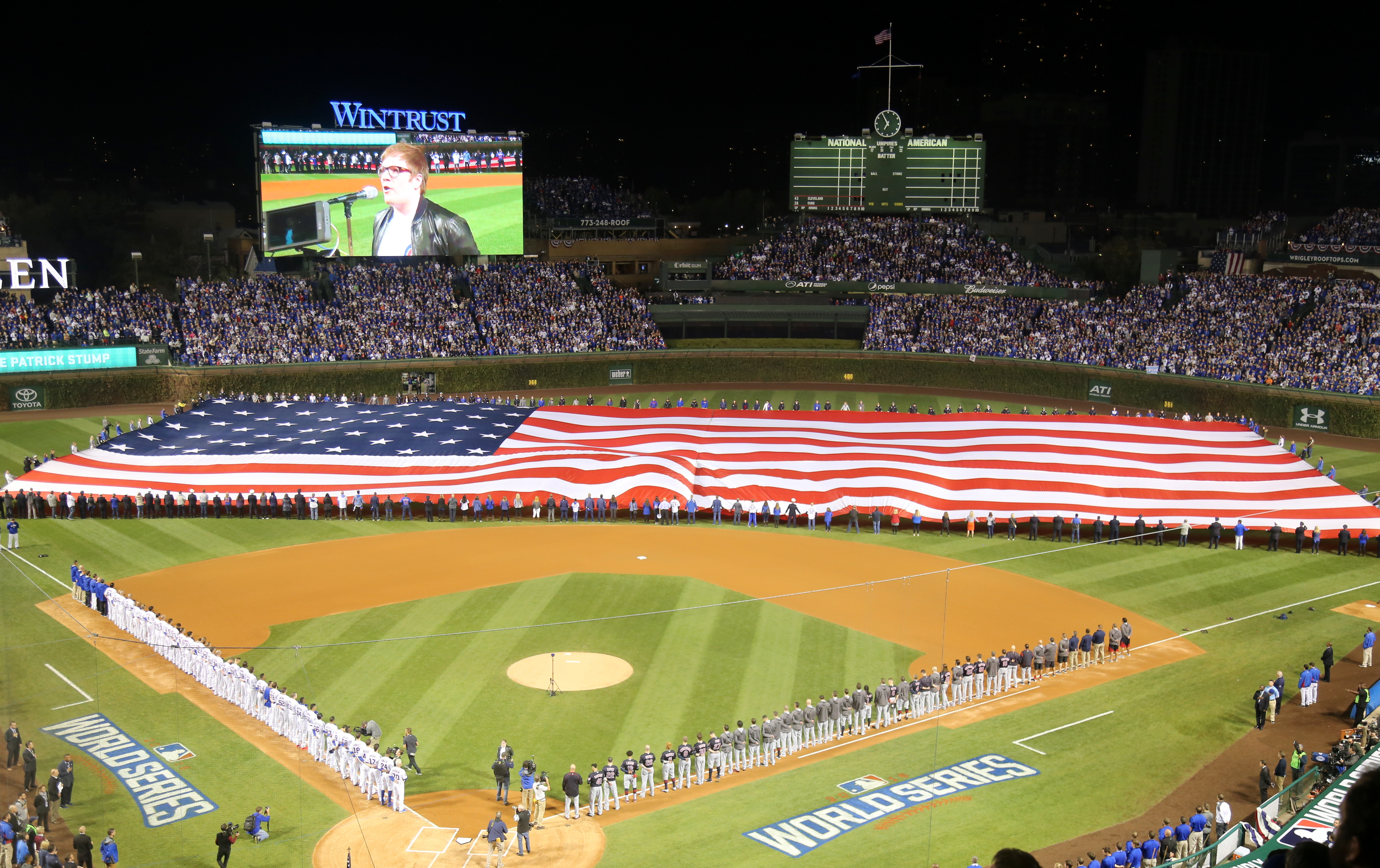 File:A giant American flag is unfurled at Wrigley Field before World ...