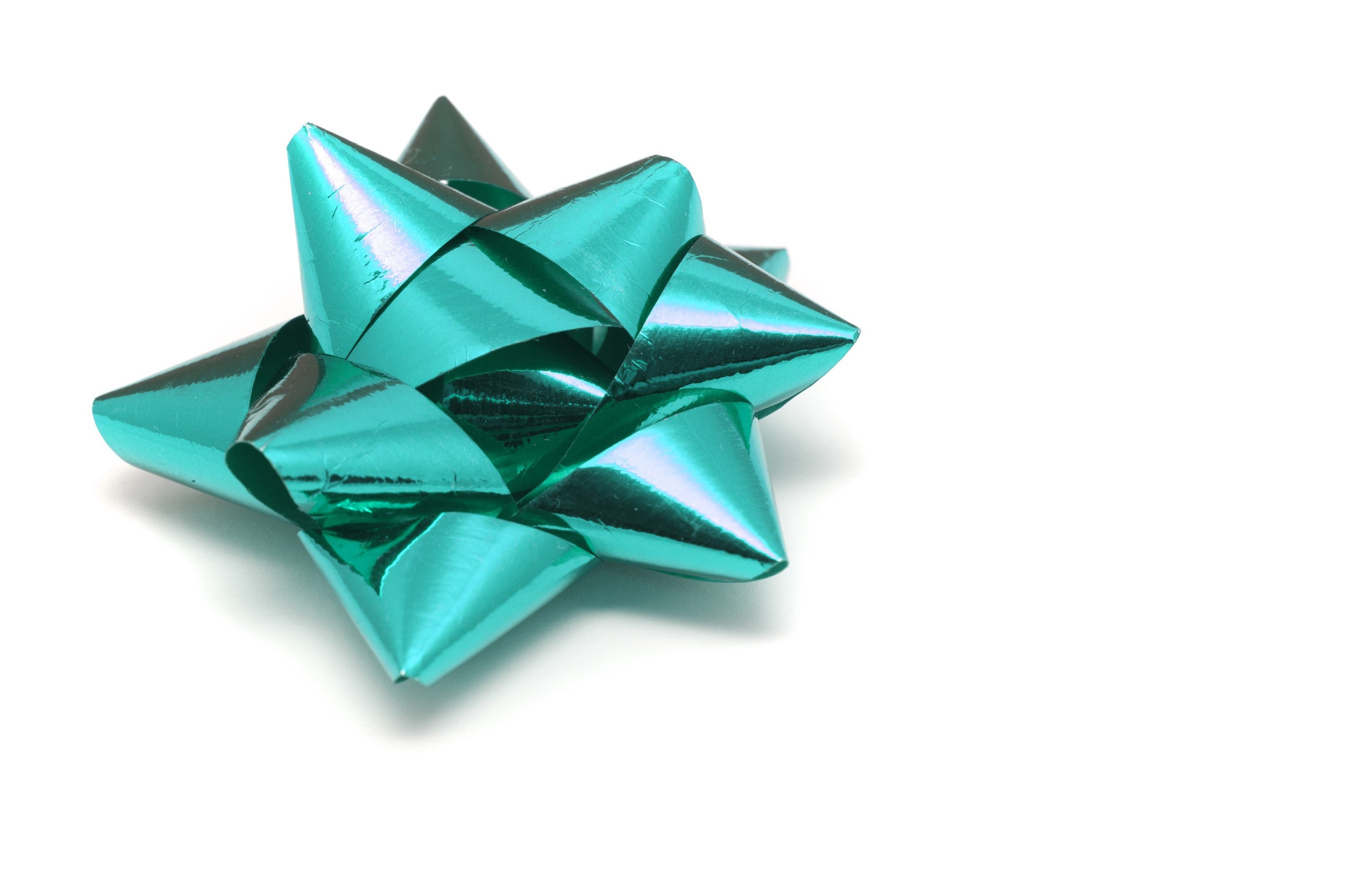 Photo of Ornate cyan bow for gift wrapping | Free christmas images