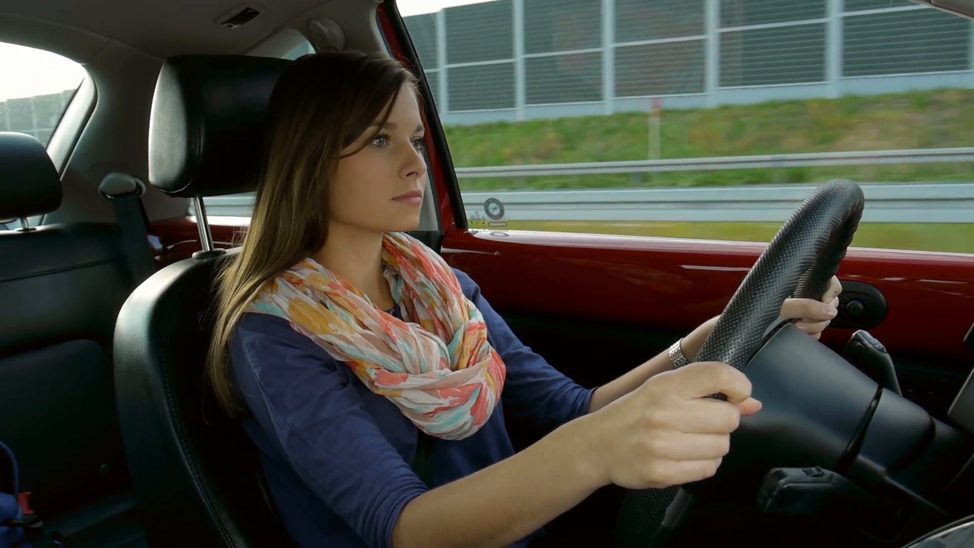 concentrated beautiful girl driving a car on a highway Stock Video ...