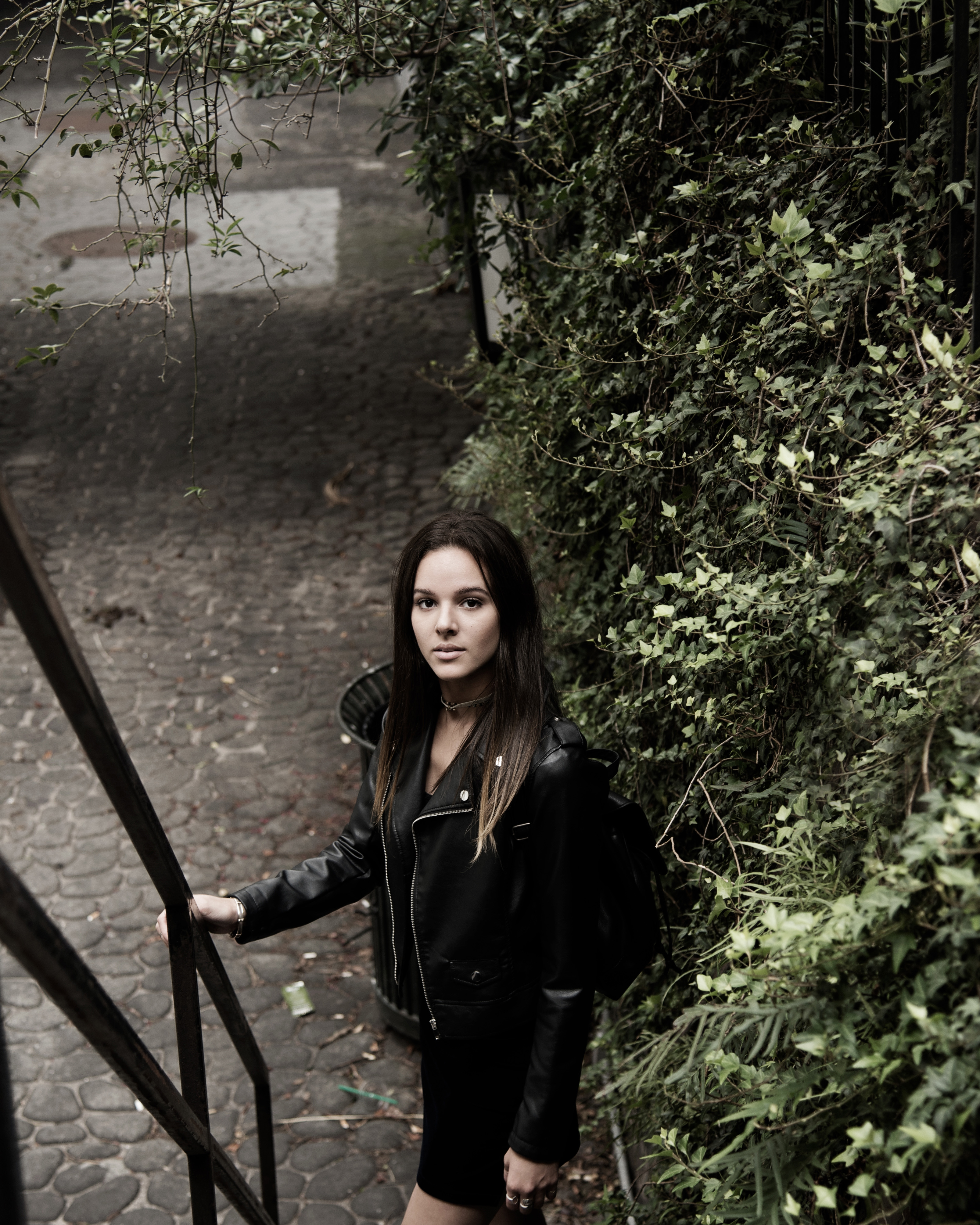 Girl in black leather jacket at bottom of stairs image - Free stock ...