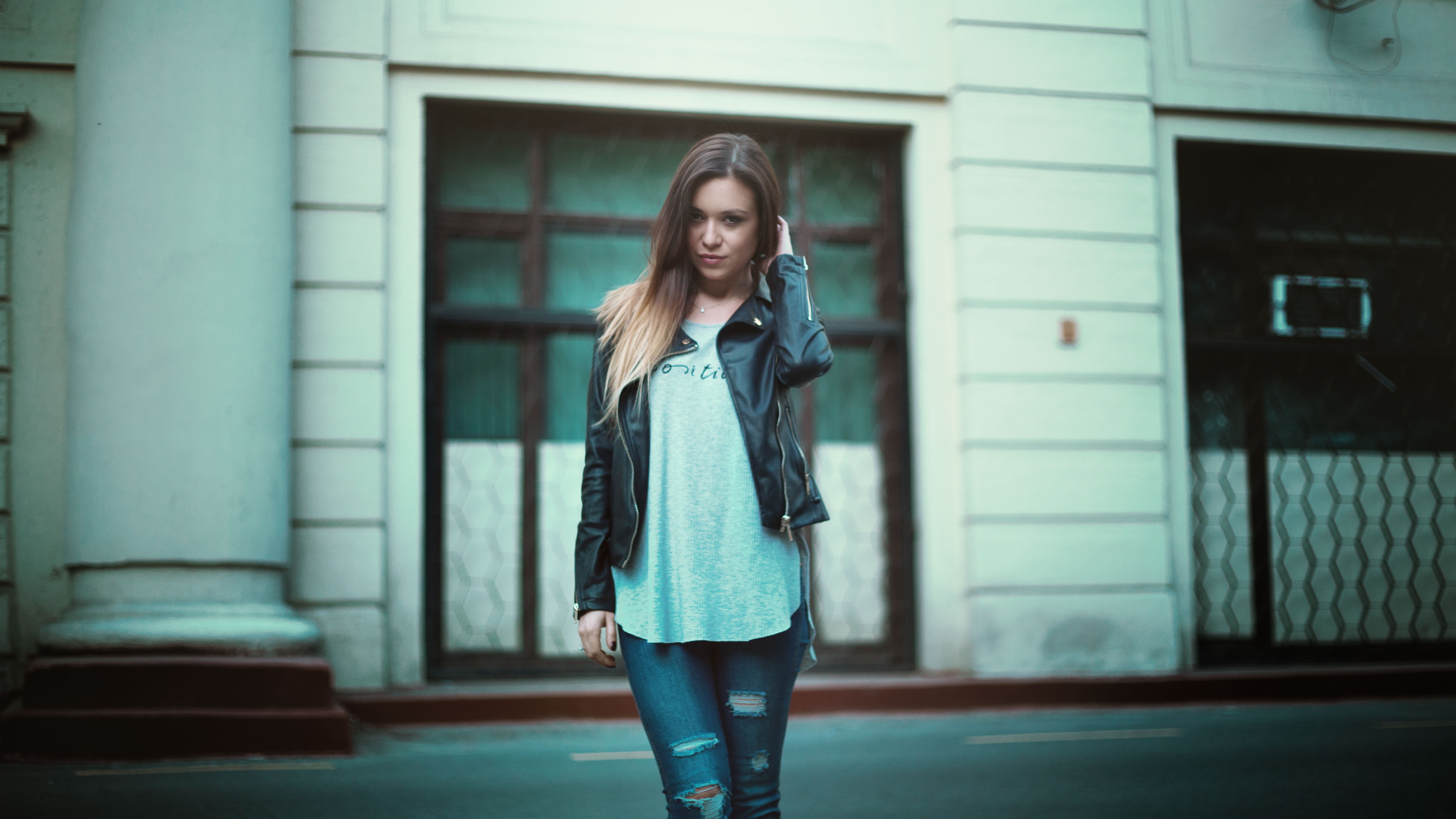 Girl in leather jacket photo