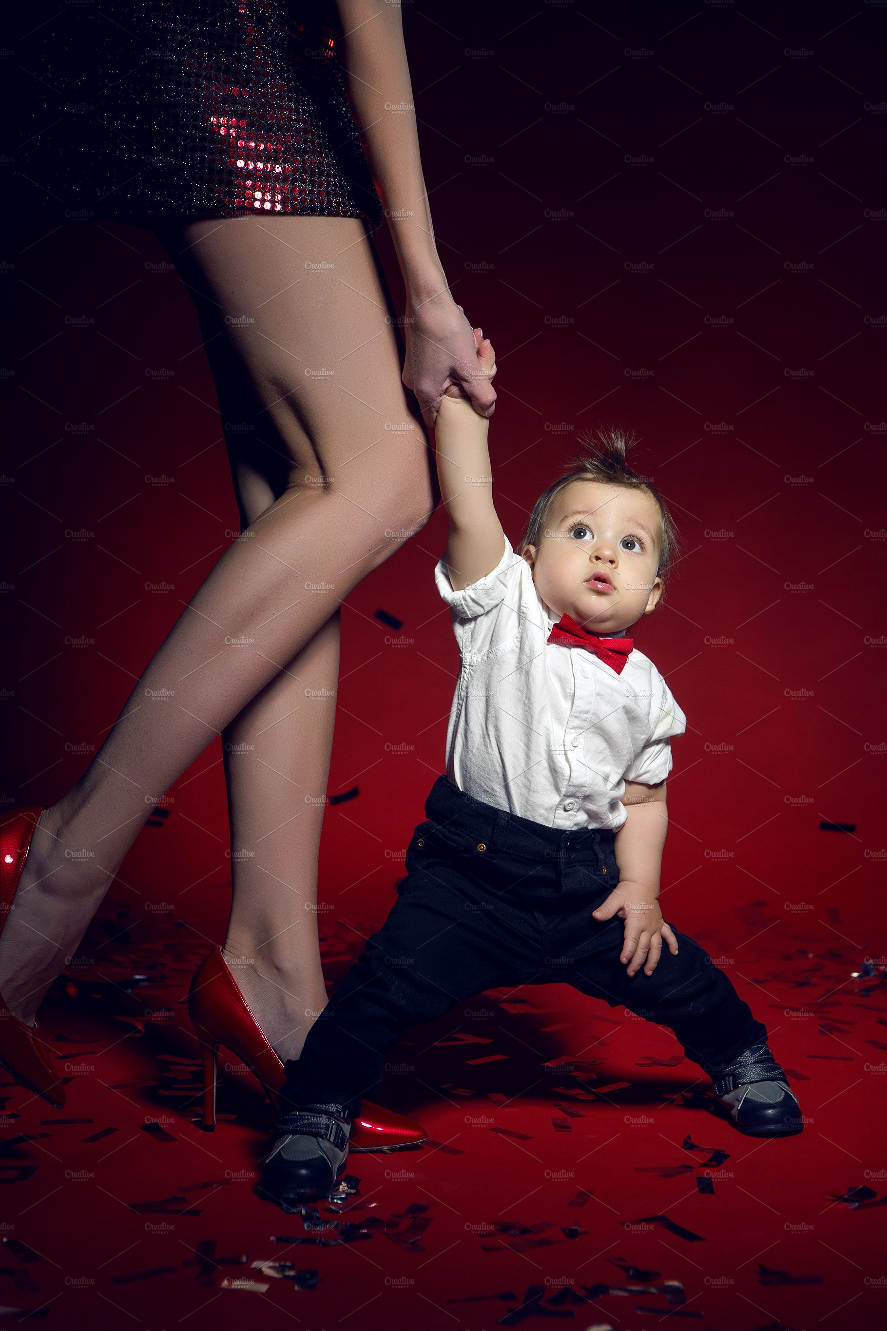 sexy girl in red short dress with a boy child ~ People Photos ...