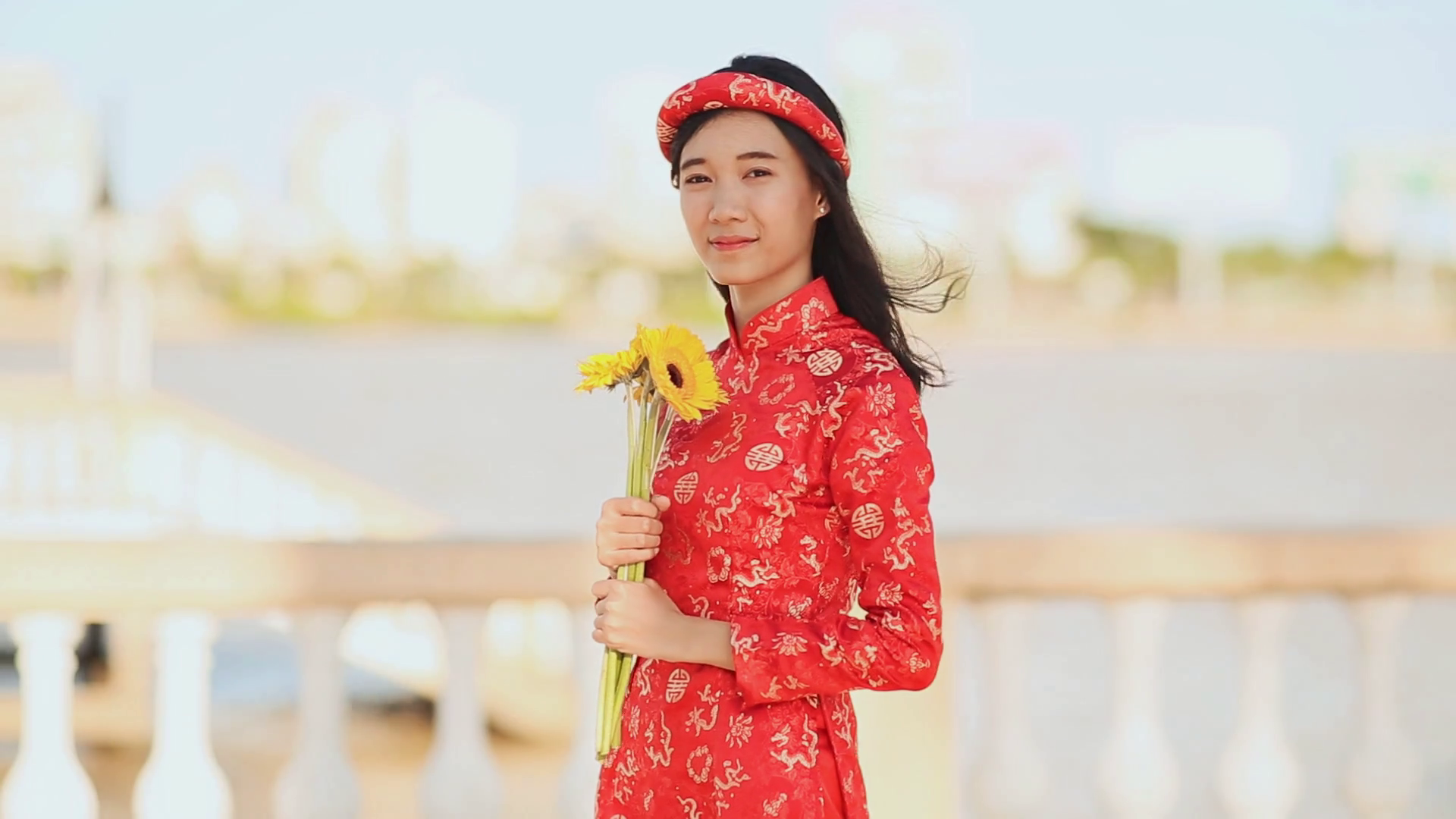 Beautiful Vietnamese girl in red traditional dress Ao Dai with ...