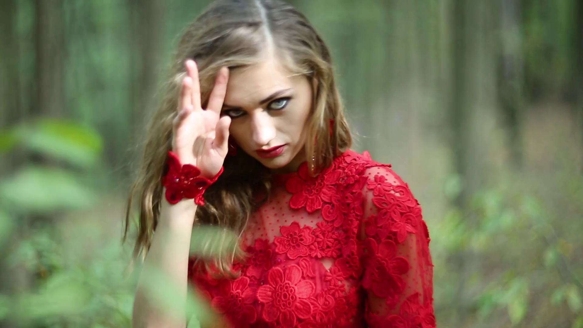 Beautiful girl in red long dress walking in forest Stock Video ...