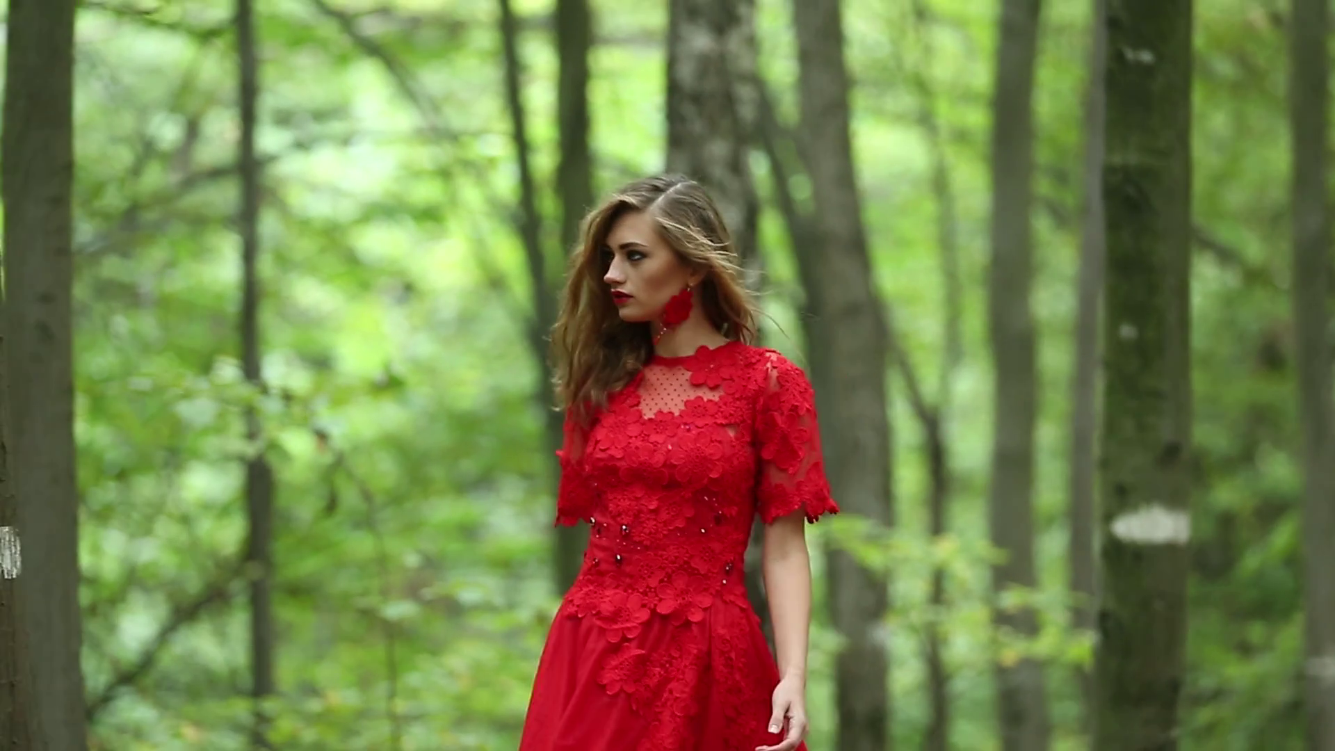 Beautiful girl in red long dress walking in forest Stock Video ...