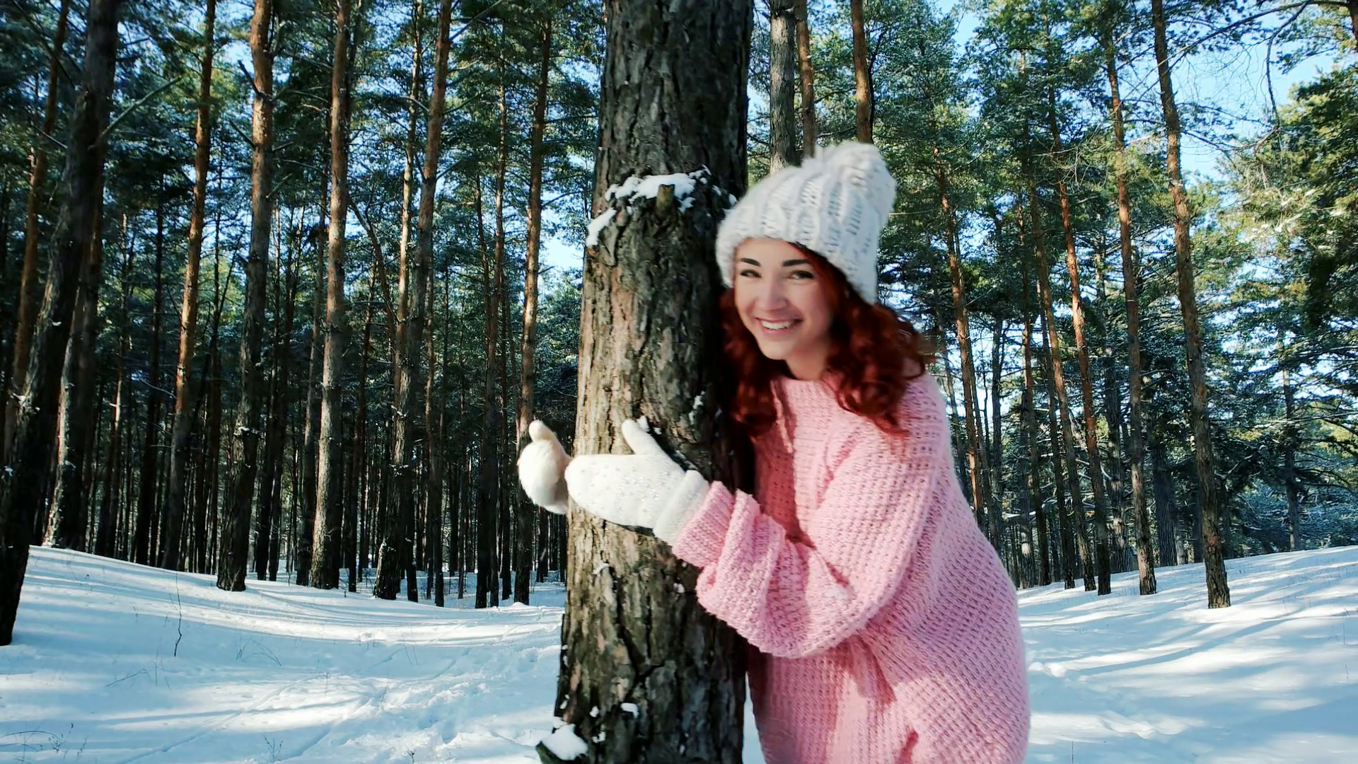 Cute girl walking in winter forest, a woman with red hair, running ...