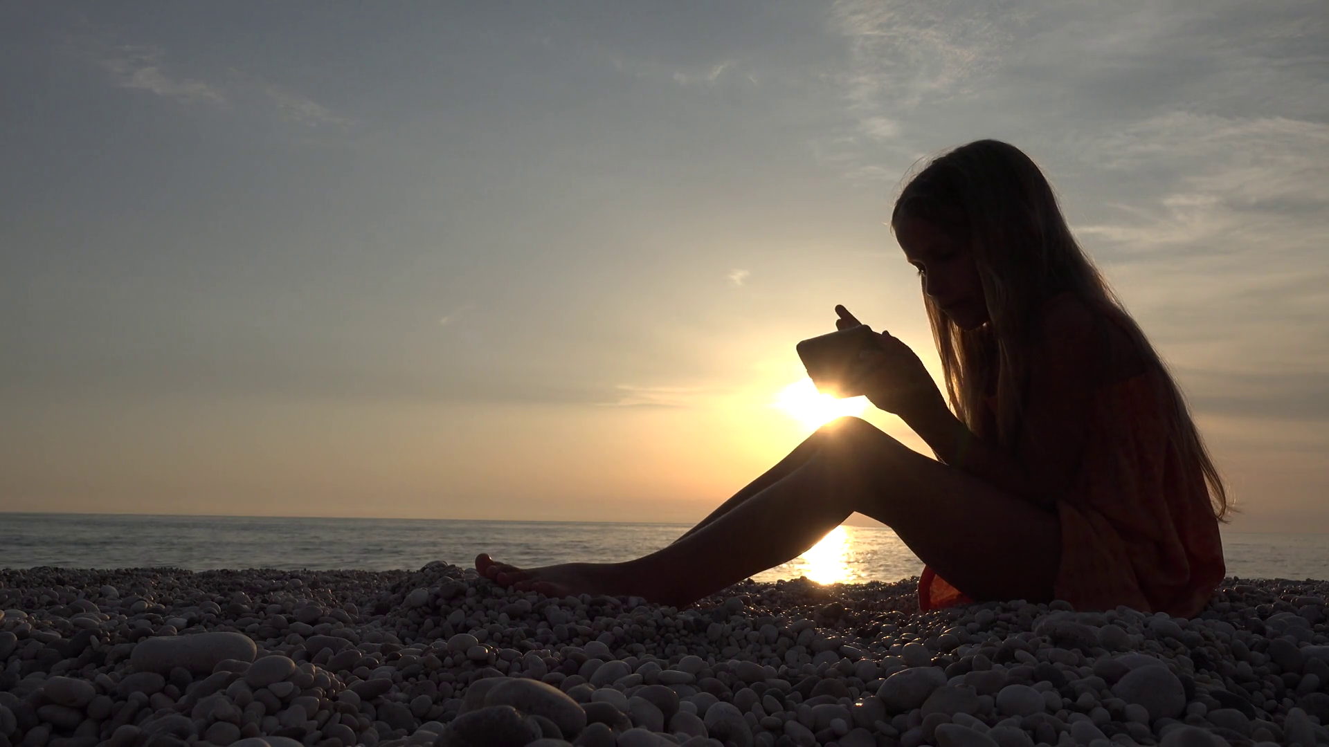 4K Child Playing Smartphone on Beach, Sunset Sea, Girl Silhouette on ...