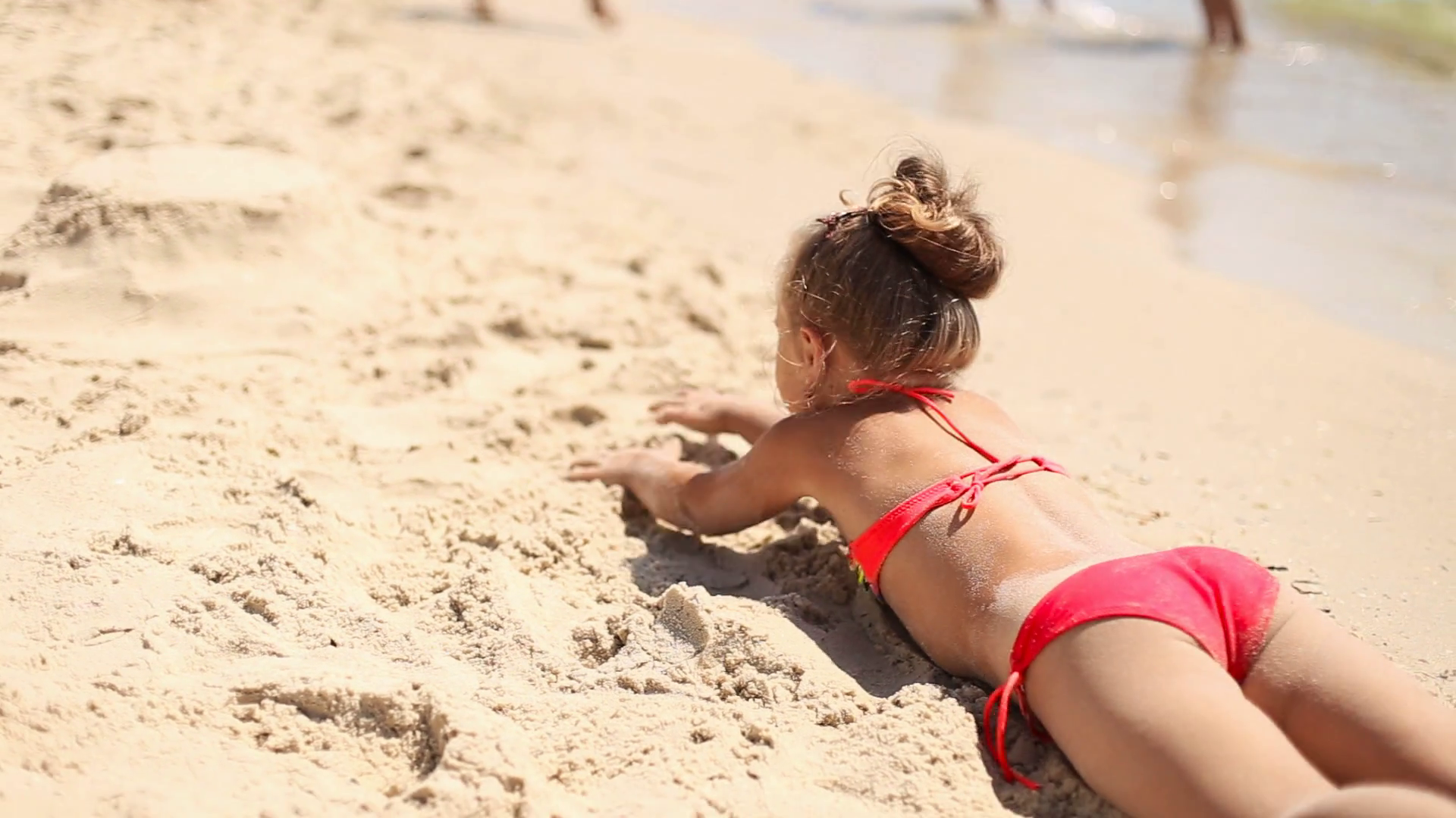 little girl playing on the beach Stock Video Footage - Videoblocks