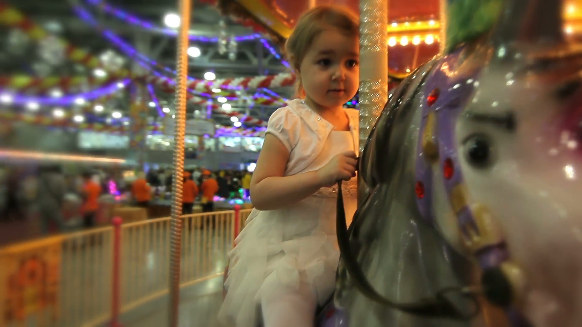 Little girl riding on Merry Go Round carousel Stock Video Footage ...