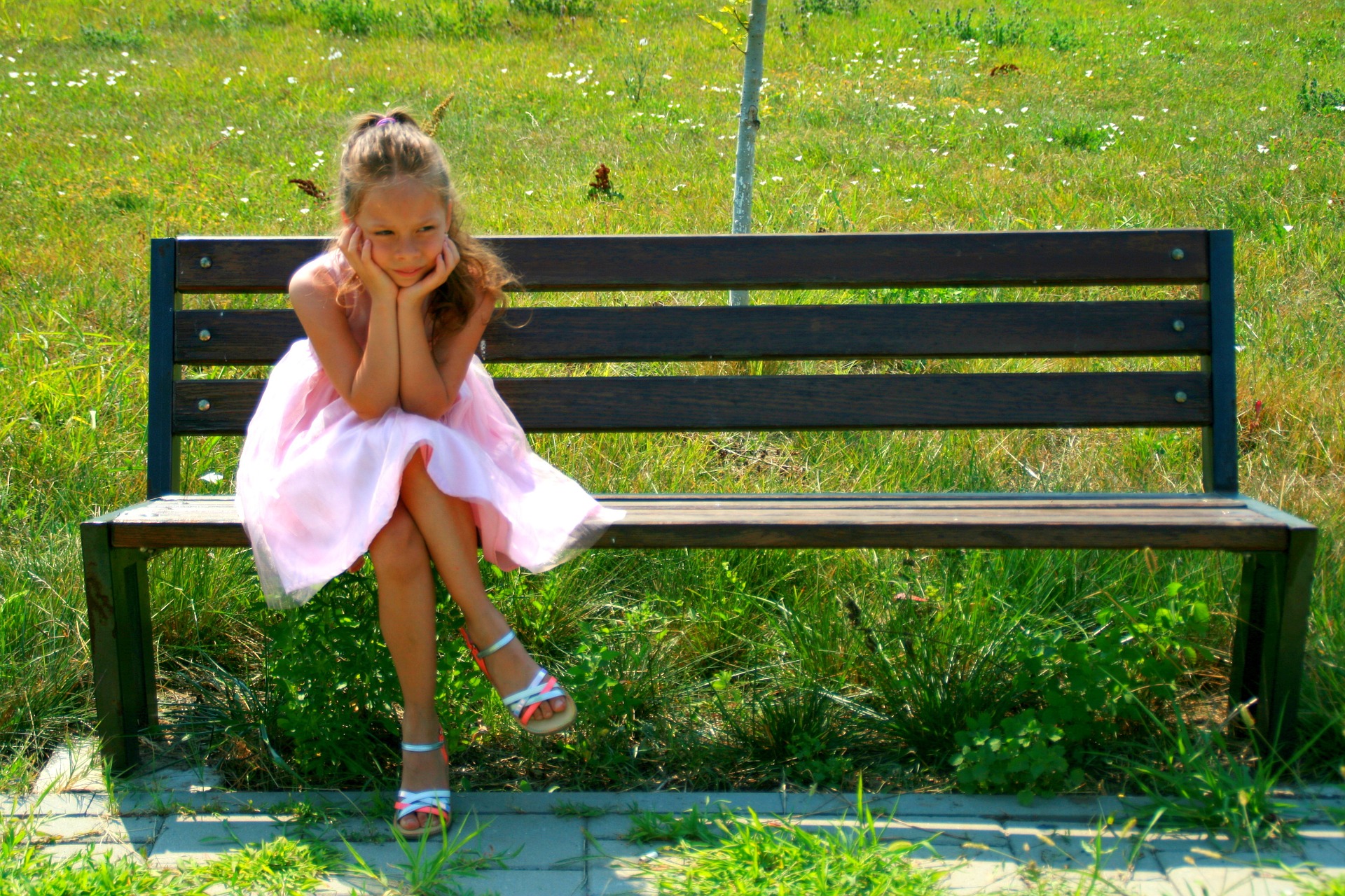 Girl on the bench photo