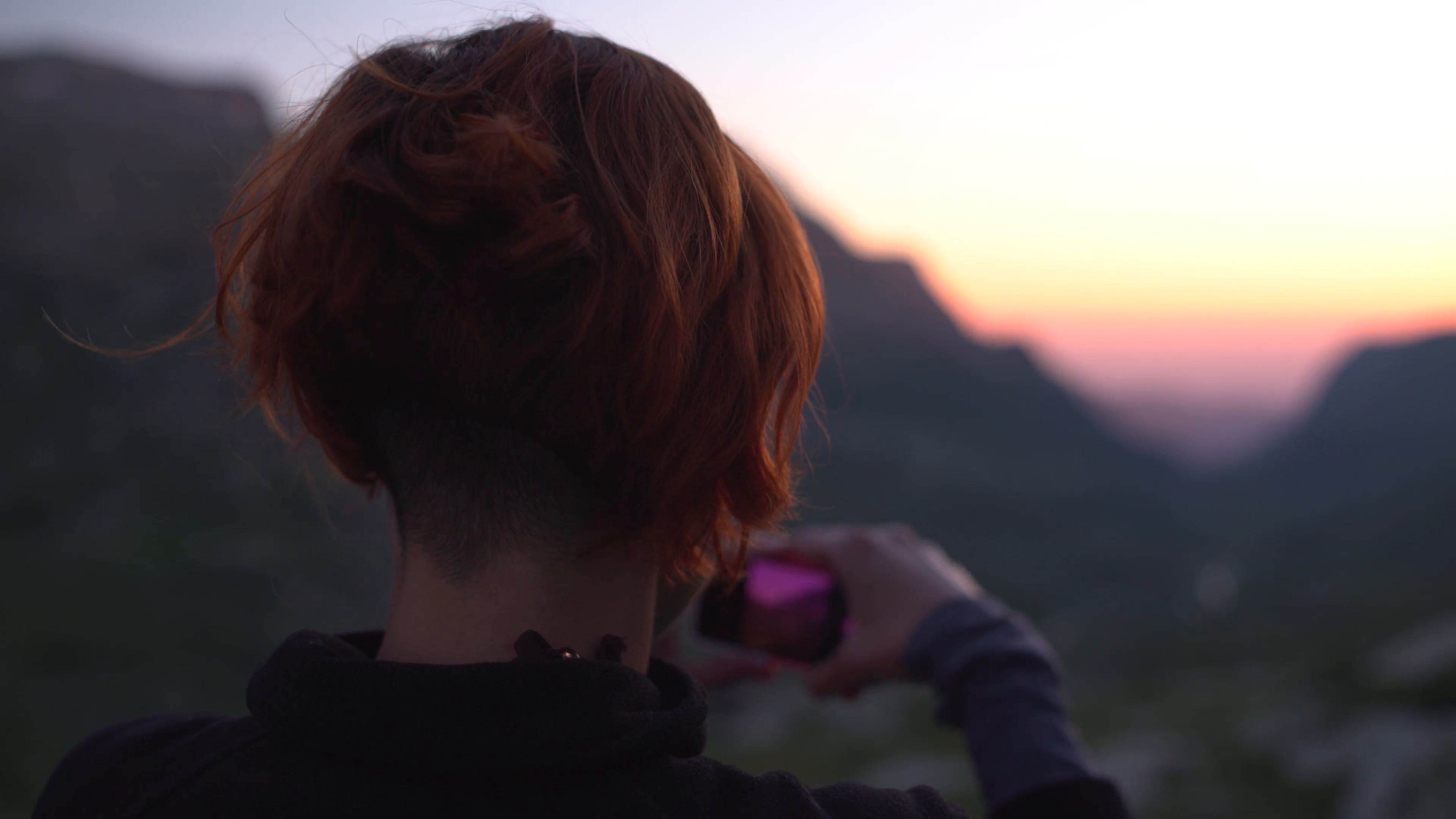 Hiker Girl Taking Photos of Mountain Sunset Closeup Handheld 4K ...