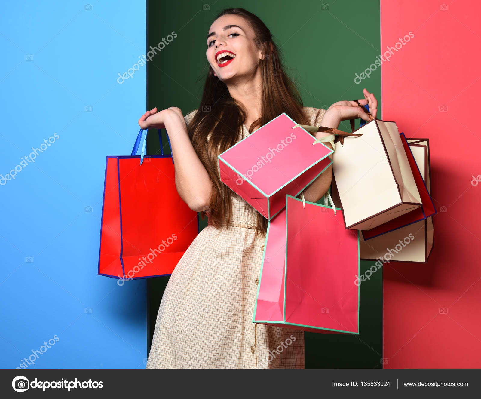 smiling colorful girl with bags — Stock Photo © stetsik #135833024
