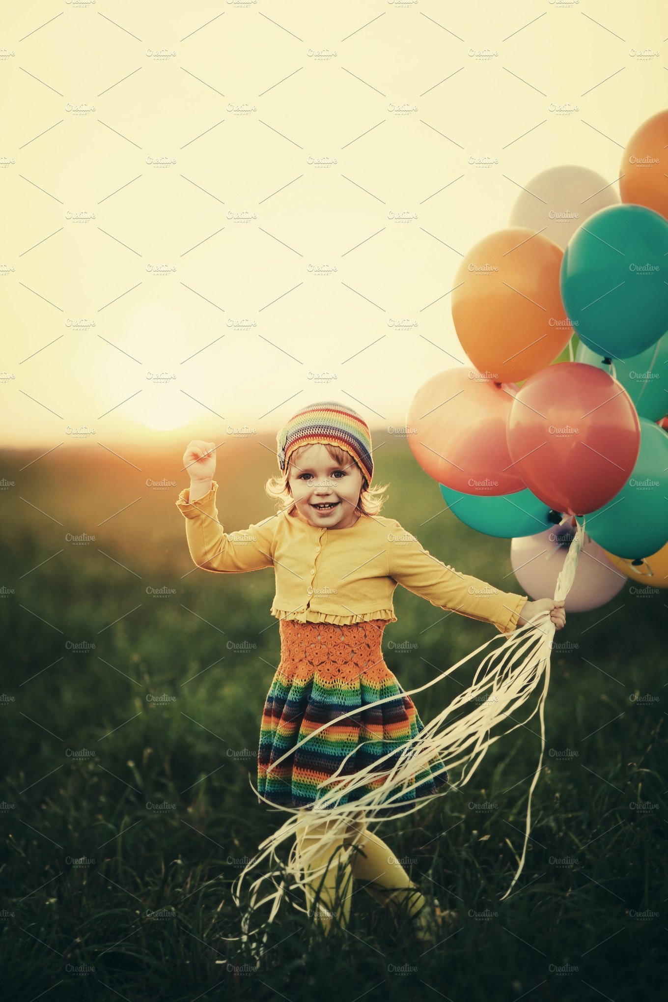 happy girl with balloons ~ People Photos ~ Creative Market