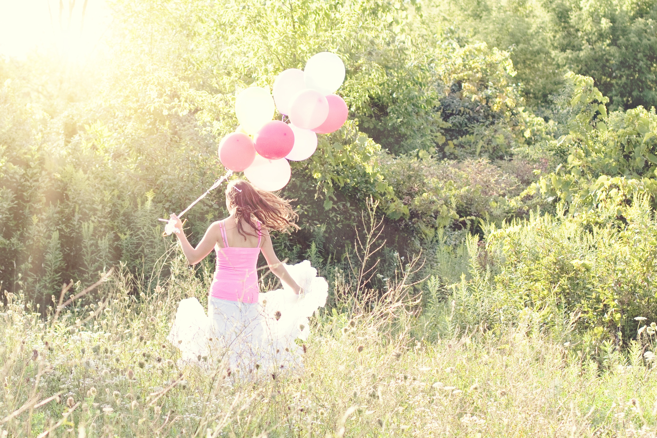 Girl with balloons photo