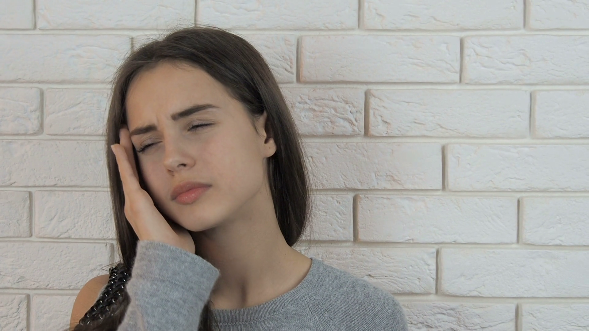 Migraine. The girl has a headache. Stock Video Footage - Videoblocks