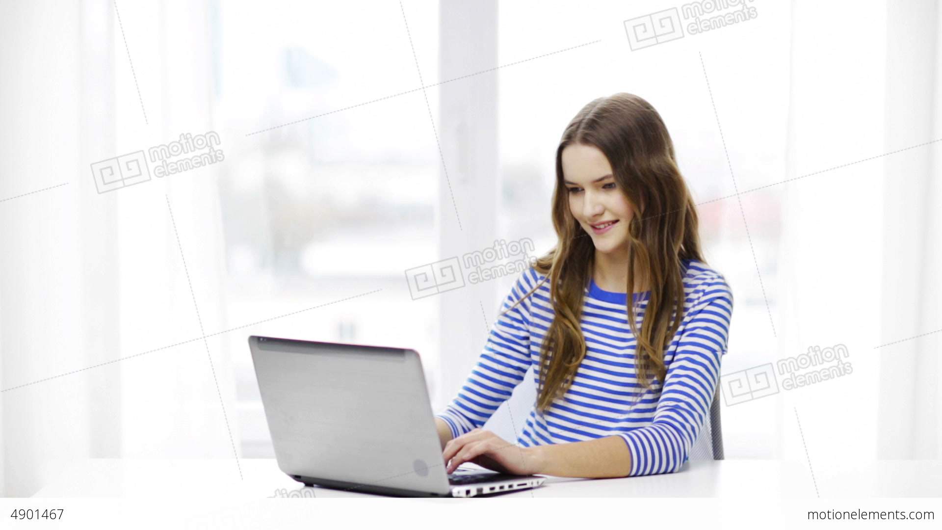 Smiling Teenage Girl With Laptop Computer At Home Stock video ...