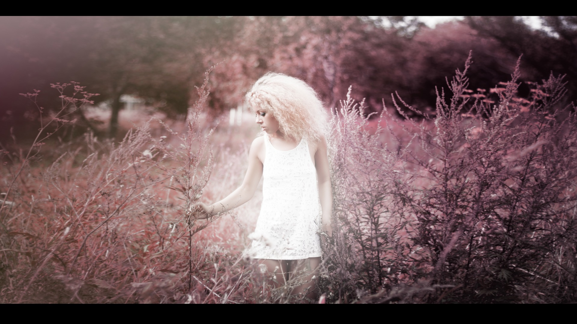 Girl with wild plants photo