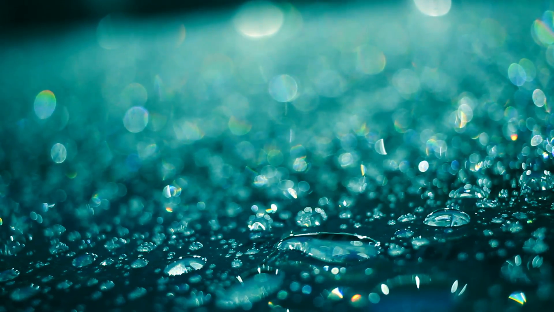 Rain drops on glass surface in aquamarine color. Macro of droplets ...