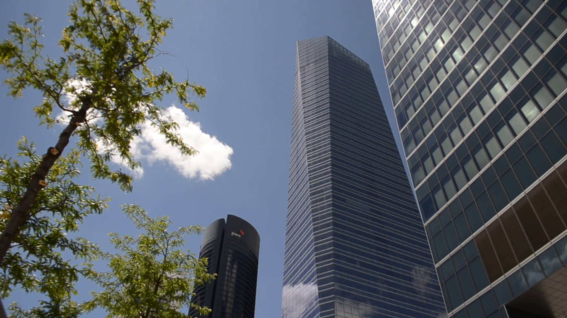 Clouds reflected on modern glassy corporate building Stock Video ...