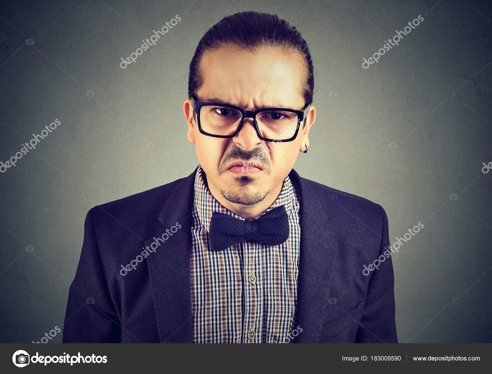 Gloomy man posing expressively — Stock Photo © SIphotography #183009590