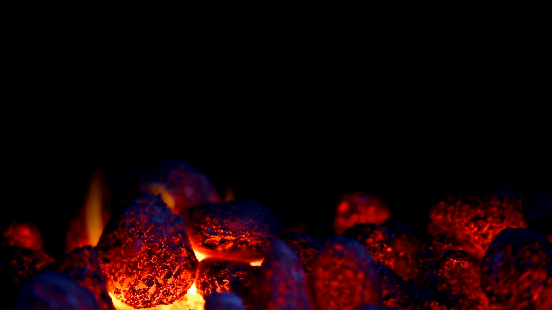 closeup of glowing coal with some flames Stock Video Footage ...