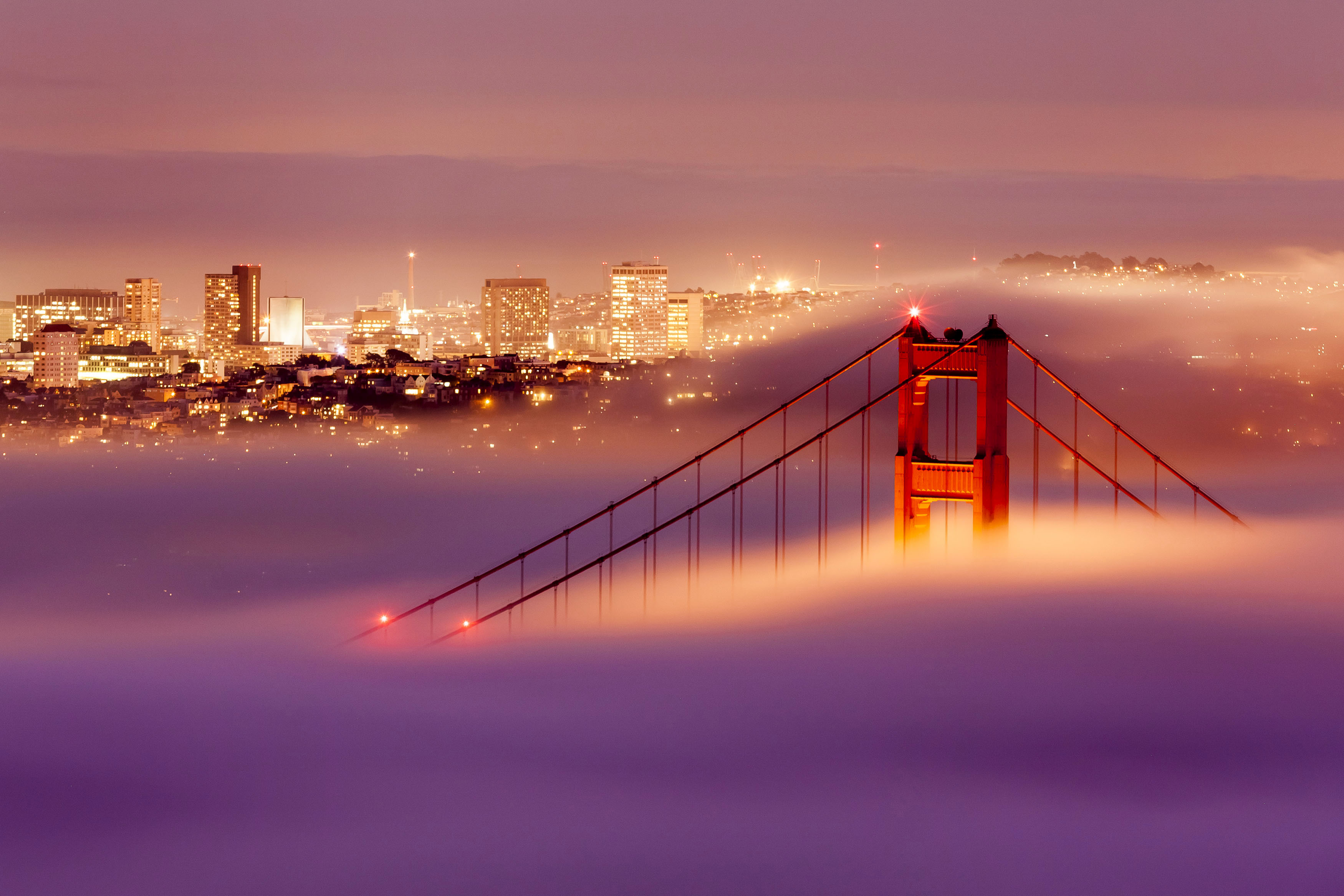 Magical pictures of the Golden Gate Bridge surrounded by fog after ...