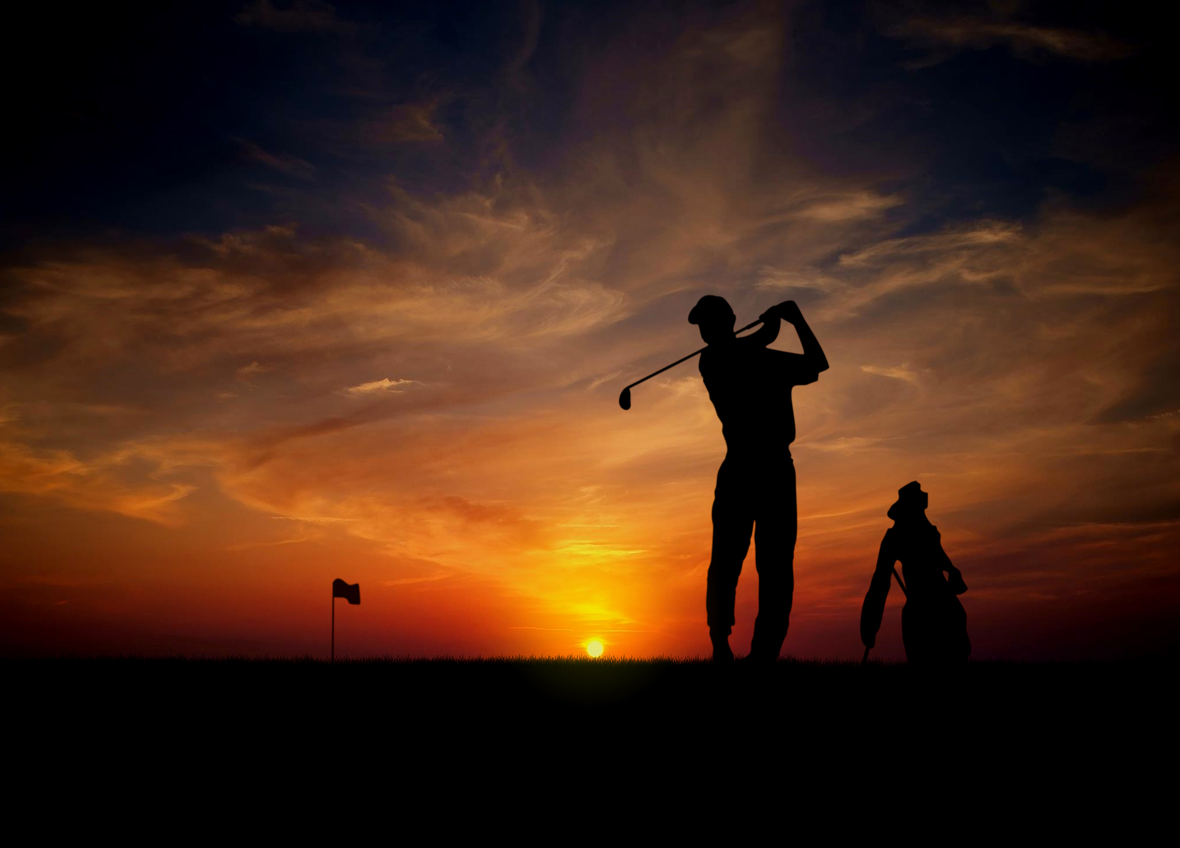 Golfer at sunset photo