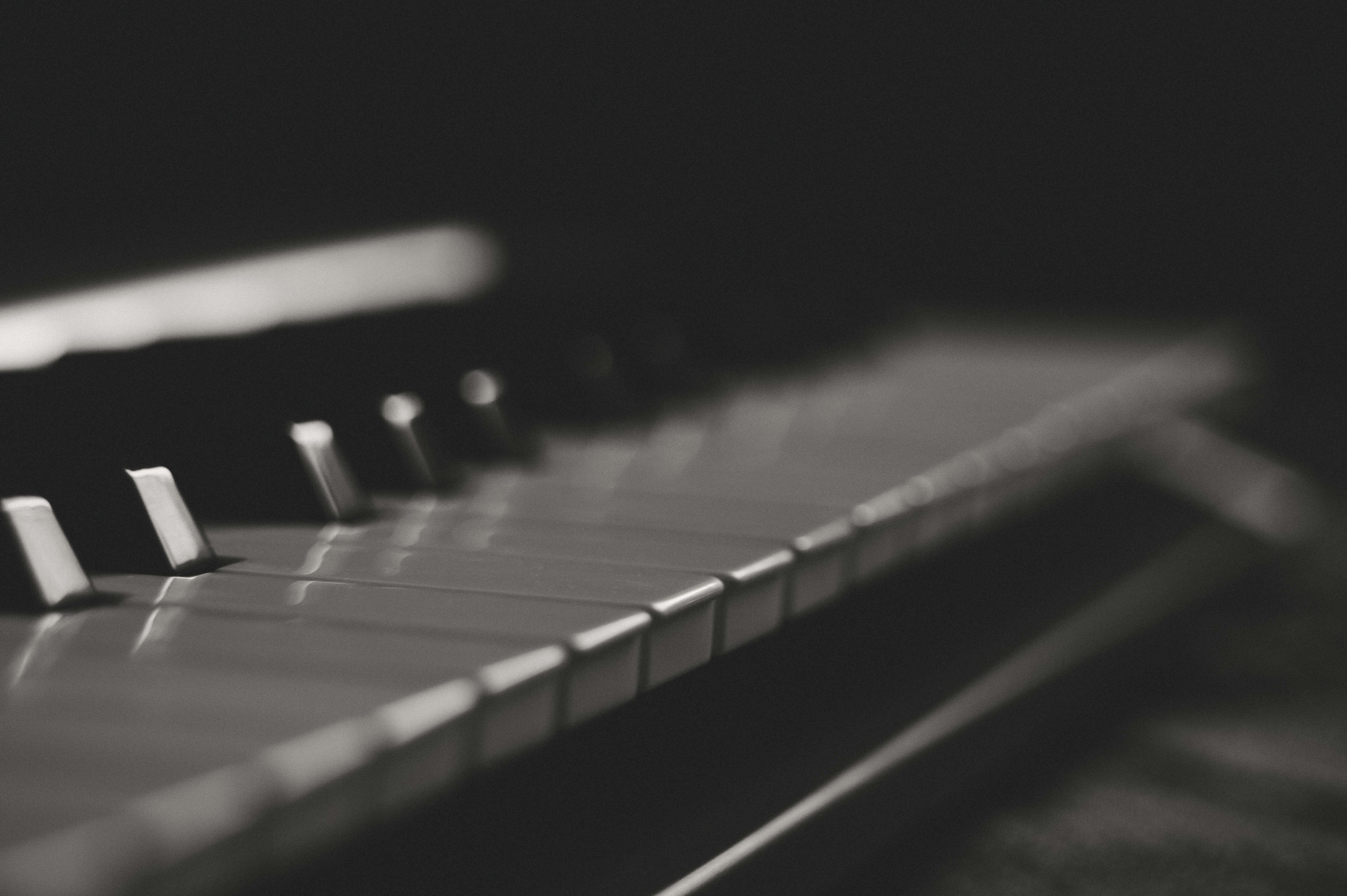 Gray and black piano keys photo