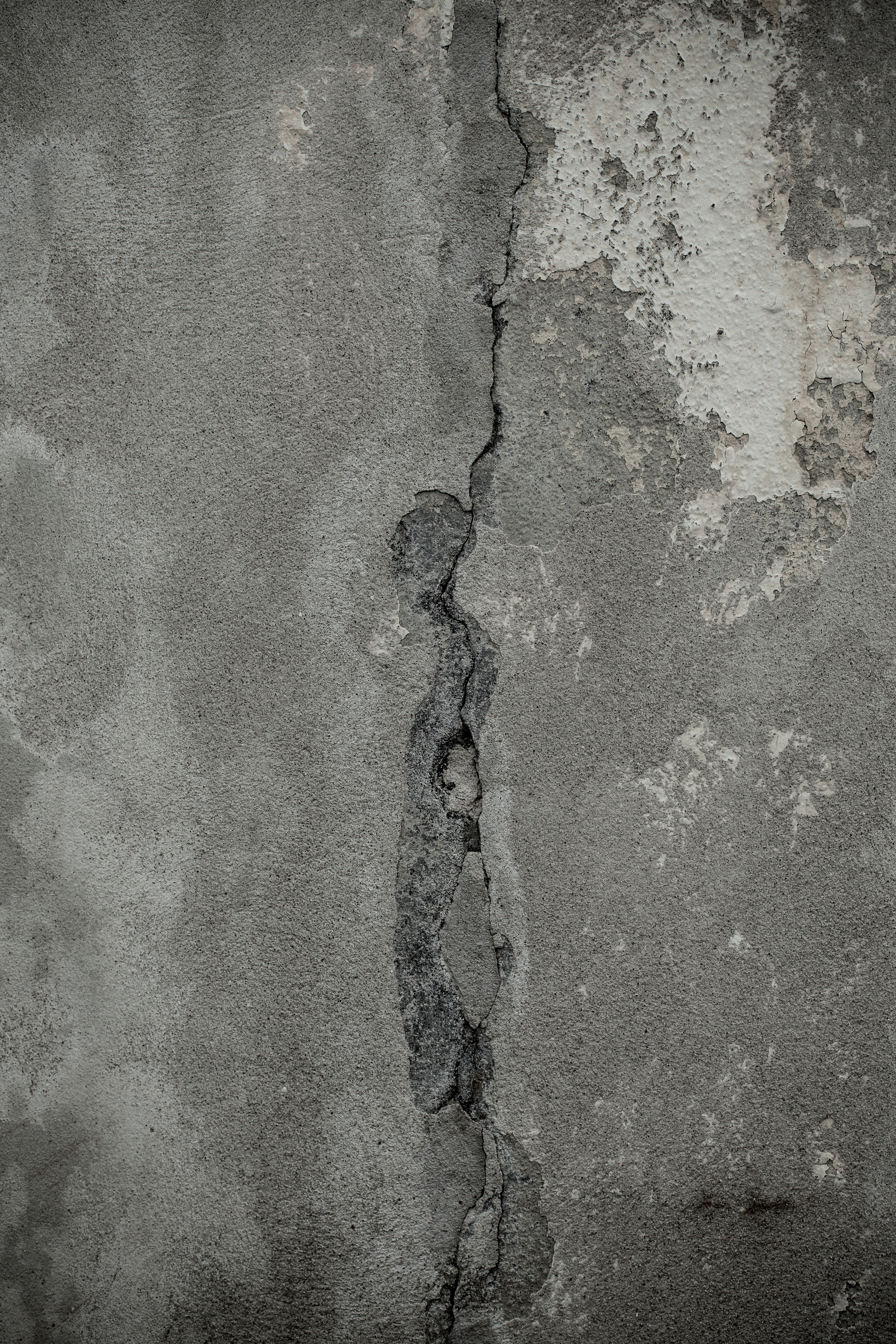 Gray cracked concrete texture photo