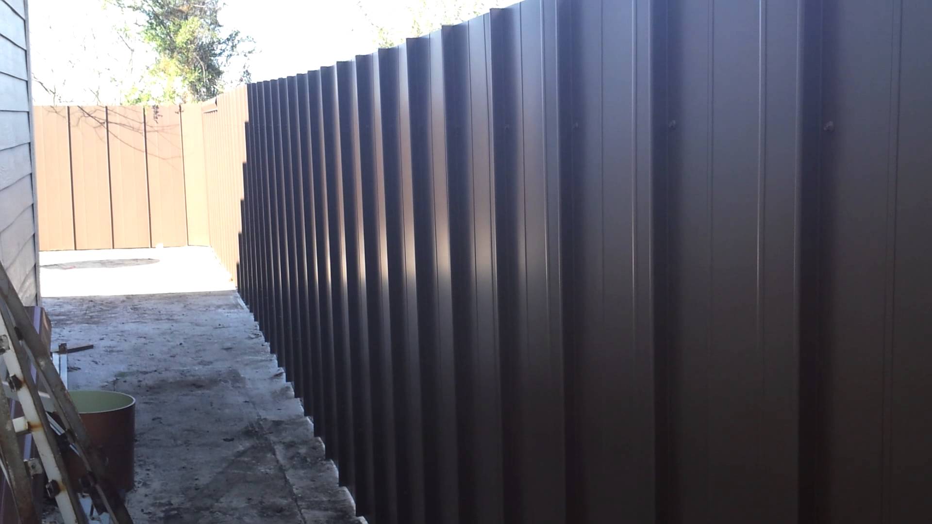 building a metal fence - YouTube
