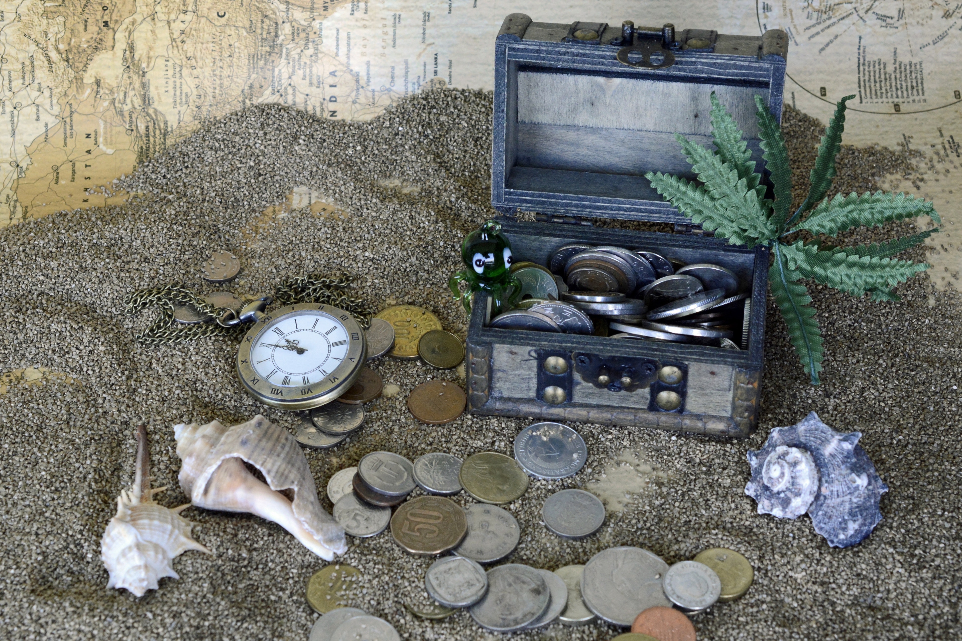 Gray Wooden Coin Box With Green Leaf Plant on Gray Sand, Box, Clock, Coins, Decoration, HQ Photo