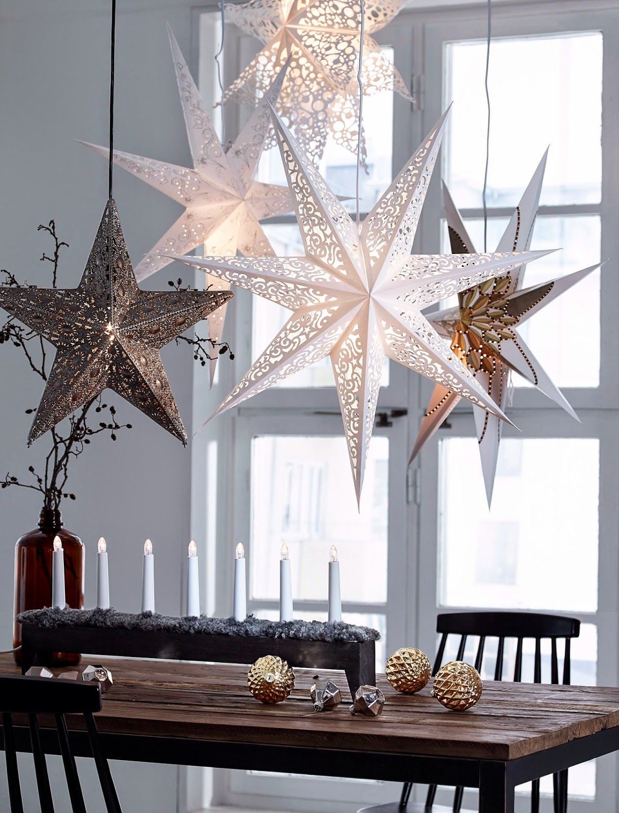 Idea for our gold stars- hang them from the light fixture over the ...