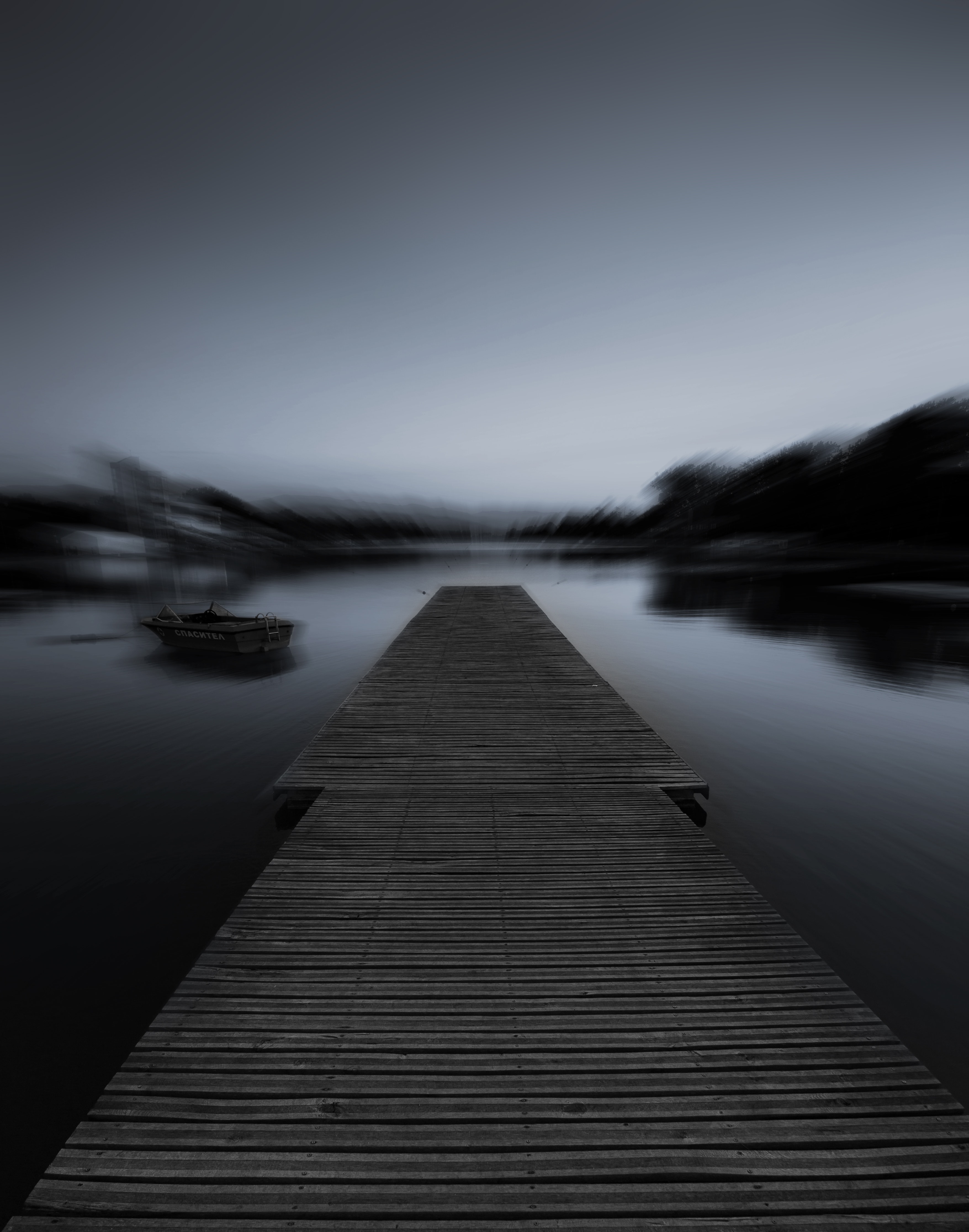 Grayscale photo of dock
